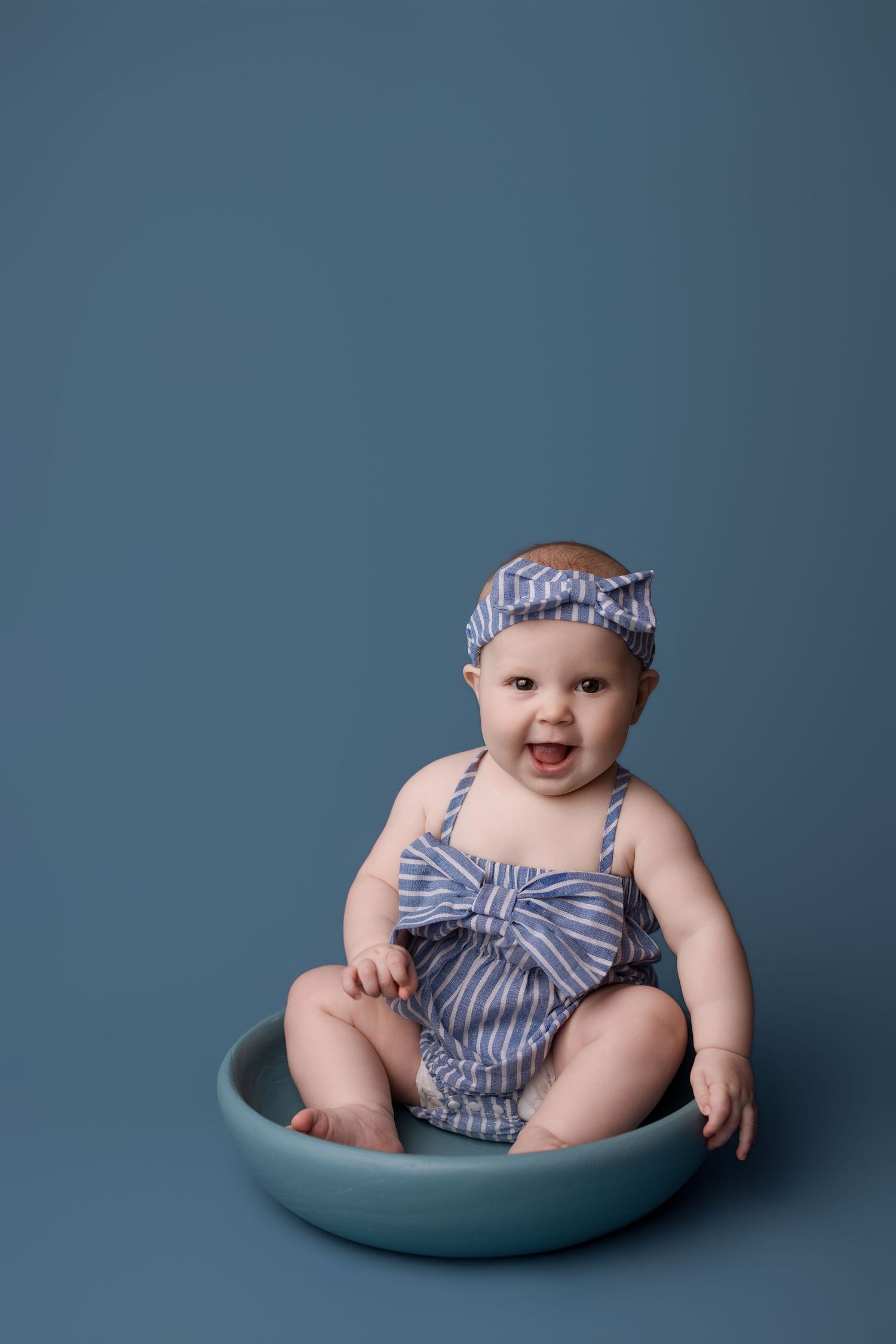 6 month old during her milestone session with Bree Elle Photography in Port Neches, TX studio.