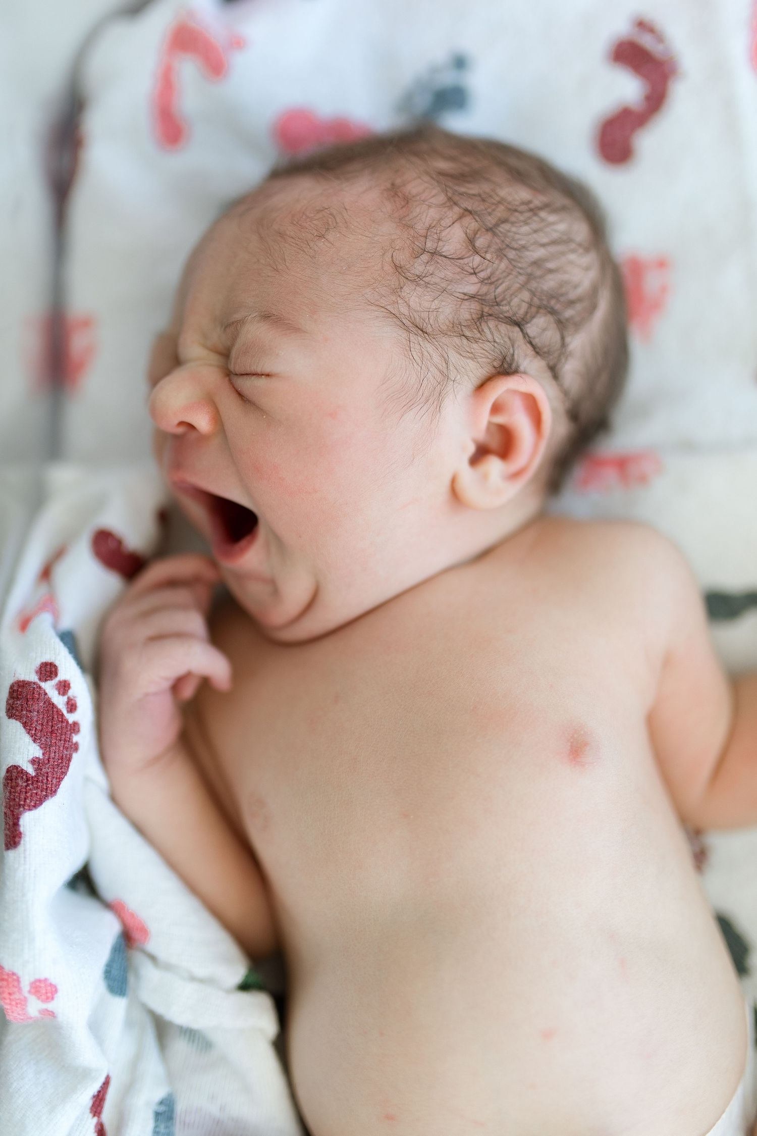 Newborn baby during their Fresh 48 session with Bree Elle Photography in Beaumont, TX at St. Elizabeth hospital.