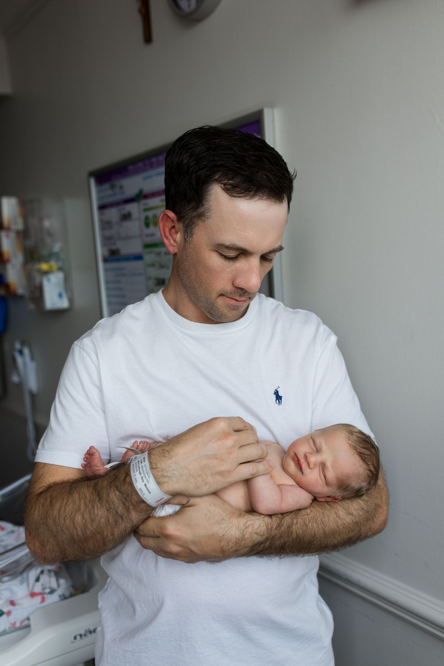 Newborn baby during Fresh 48 session at St. Elizabeth hospital in Beaumont, TX with Bree Elle Photography.