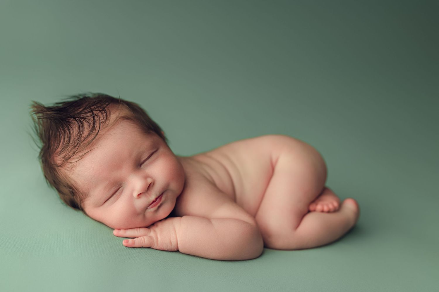 Newborn baby during studio session in Beaumont, TX with Bree Elle Photography.