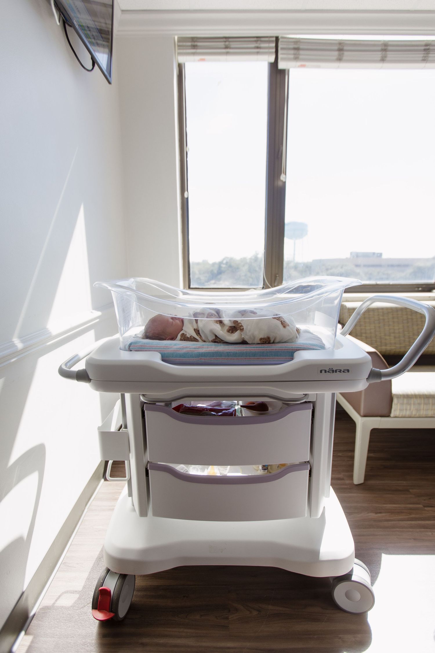 Newborn baby in a hospital bassinet during Fresh 48 session in Beaumont hospital.