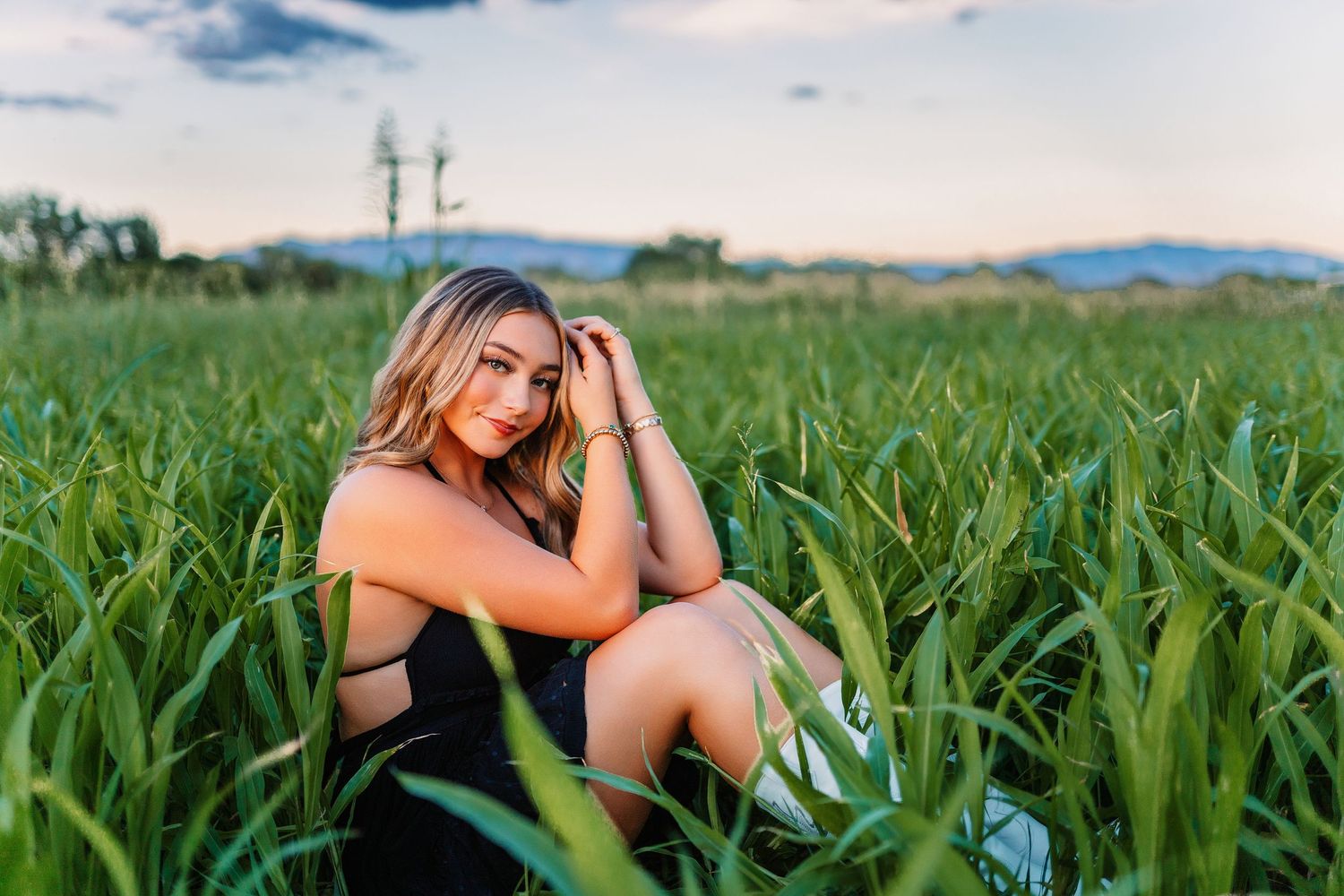 A series of outdoor portrait shots in a green field during golden hour.portraits, images, session, photo shoot