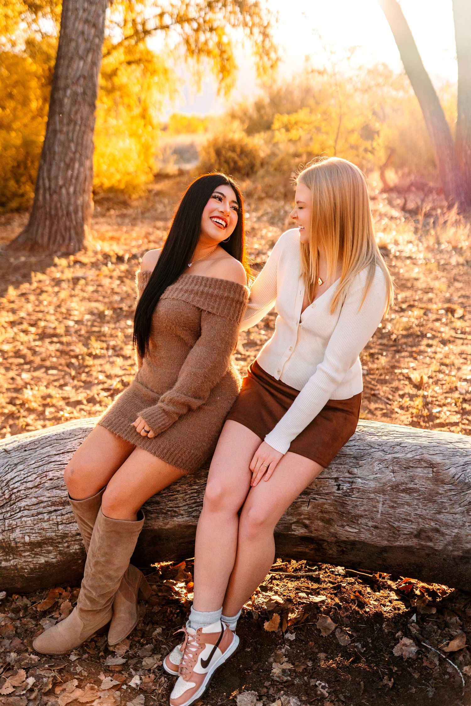 Two friends sitting on a fallen log during golden hour autumn photoshoot.downtown Albuquerque
Bosque / cottonwoods