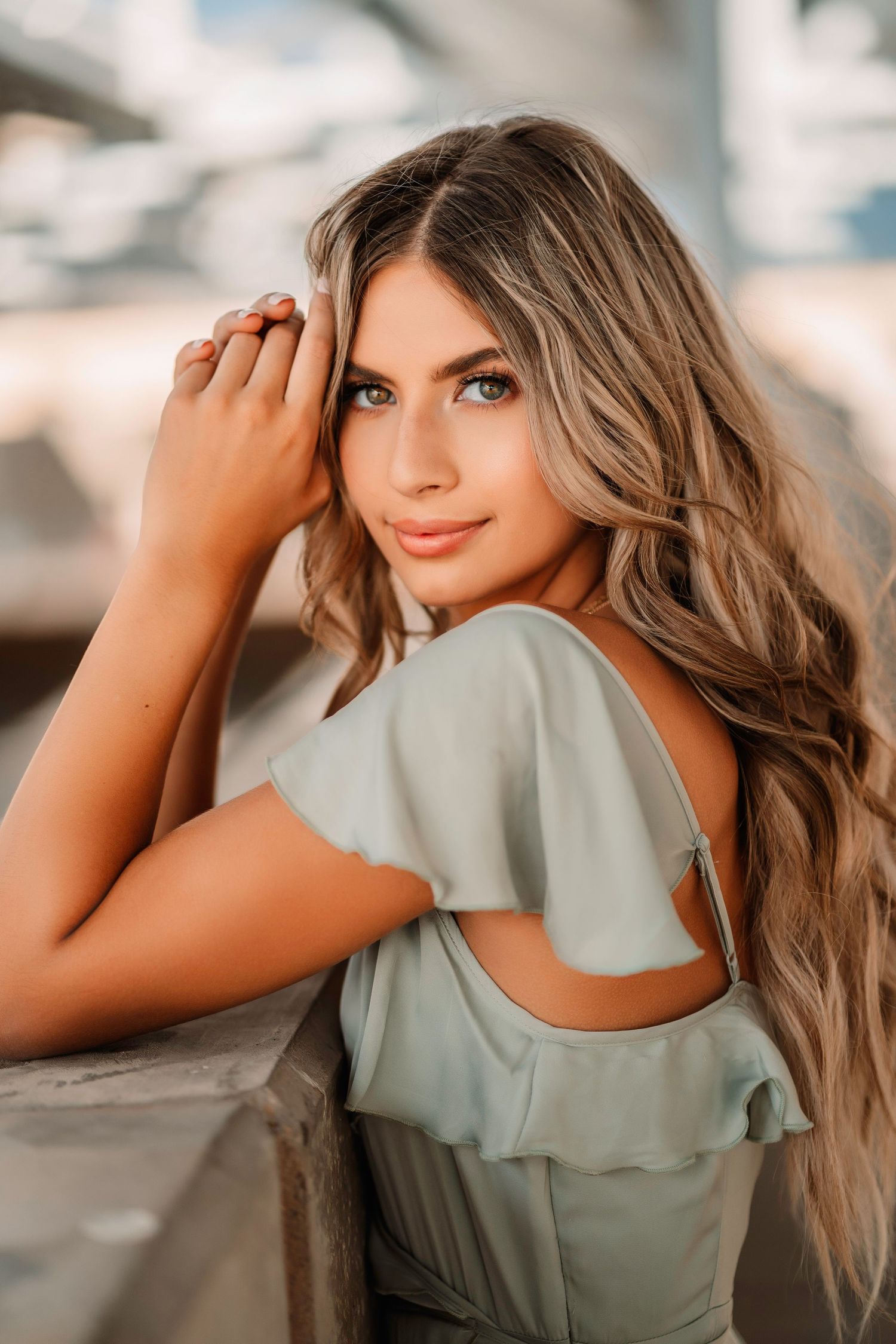 Close-up portrait series showing someone in a mint green top with soft lighting.