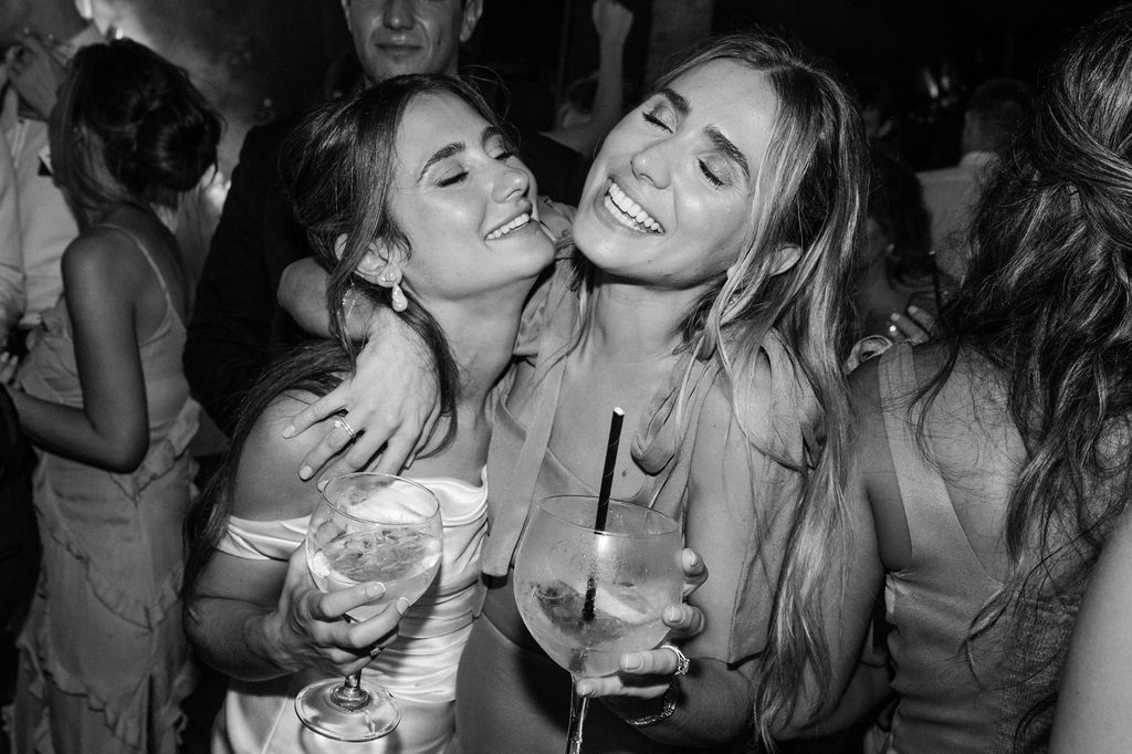 Black and white shots of guests dancing and celebrating at a nighttime party.