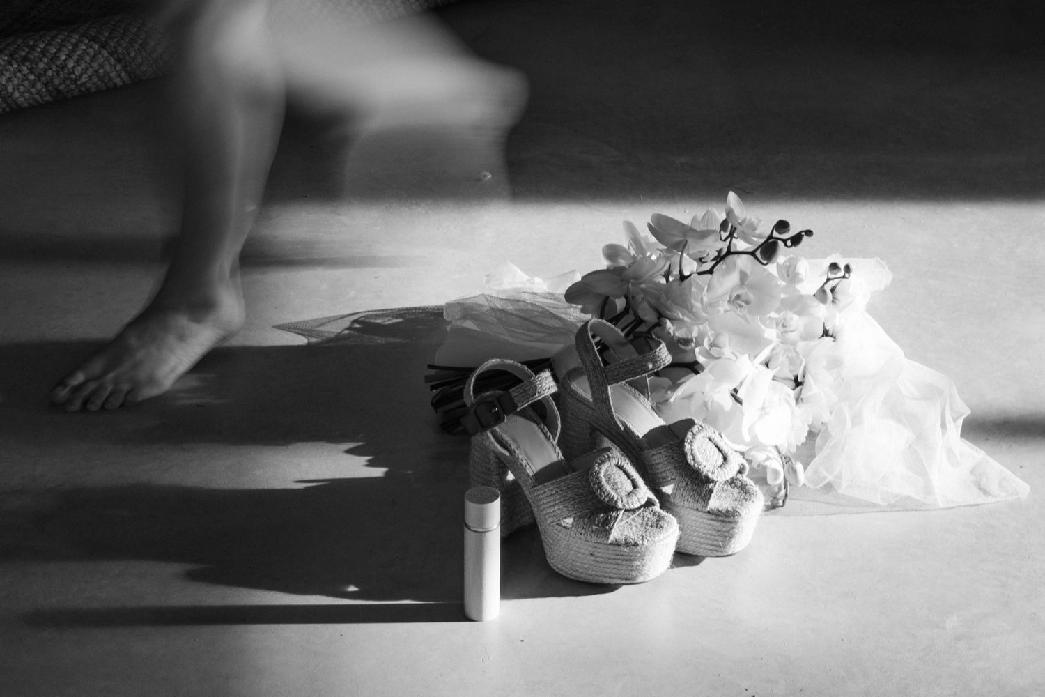 A series of black and white photographs showing the process of preparing food in a kitchen setting.