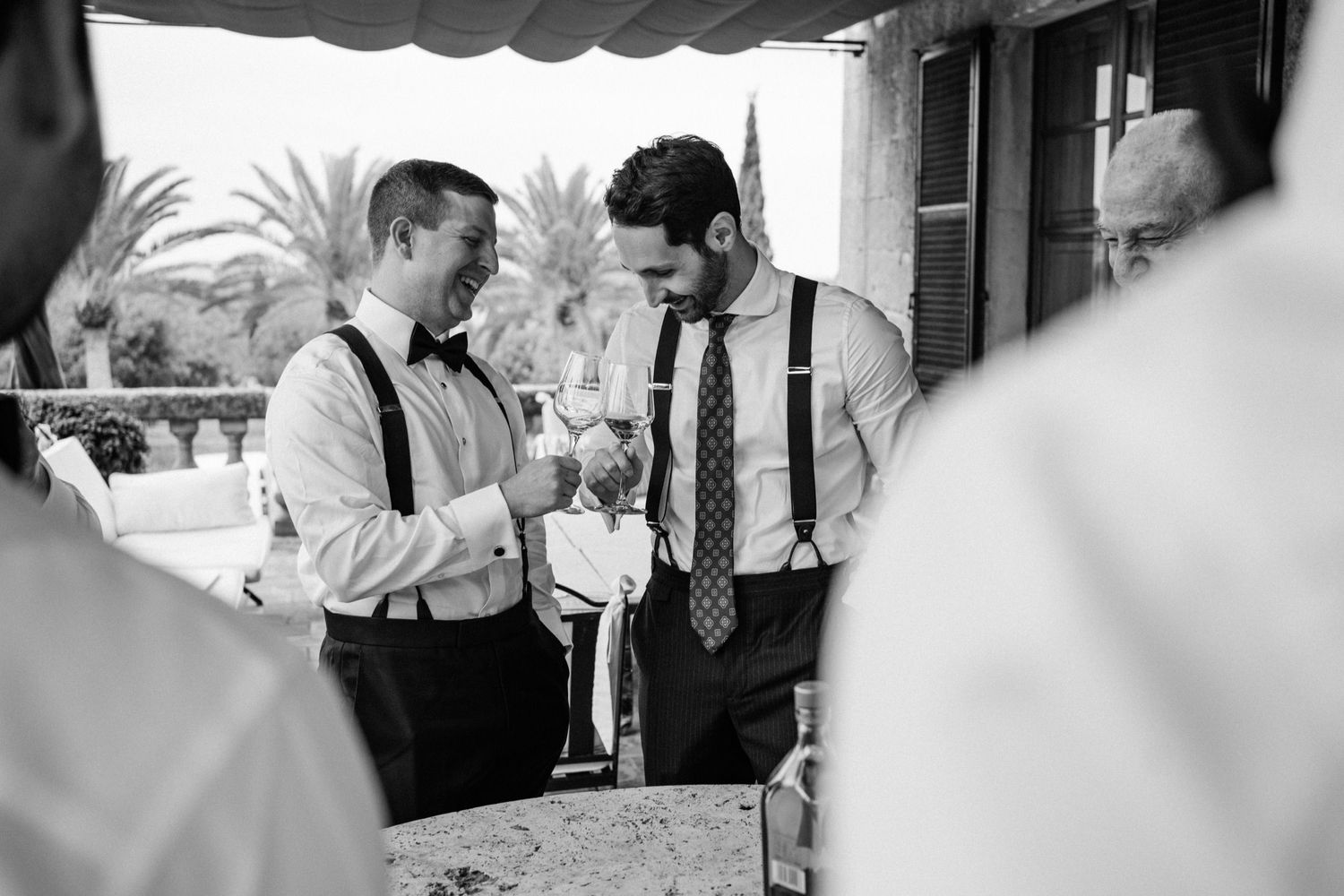 A black and white photo series showing people drinking and socializing at what appears to be a bar or party.