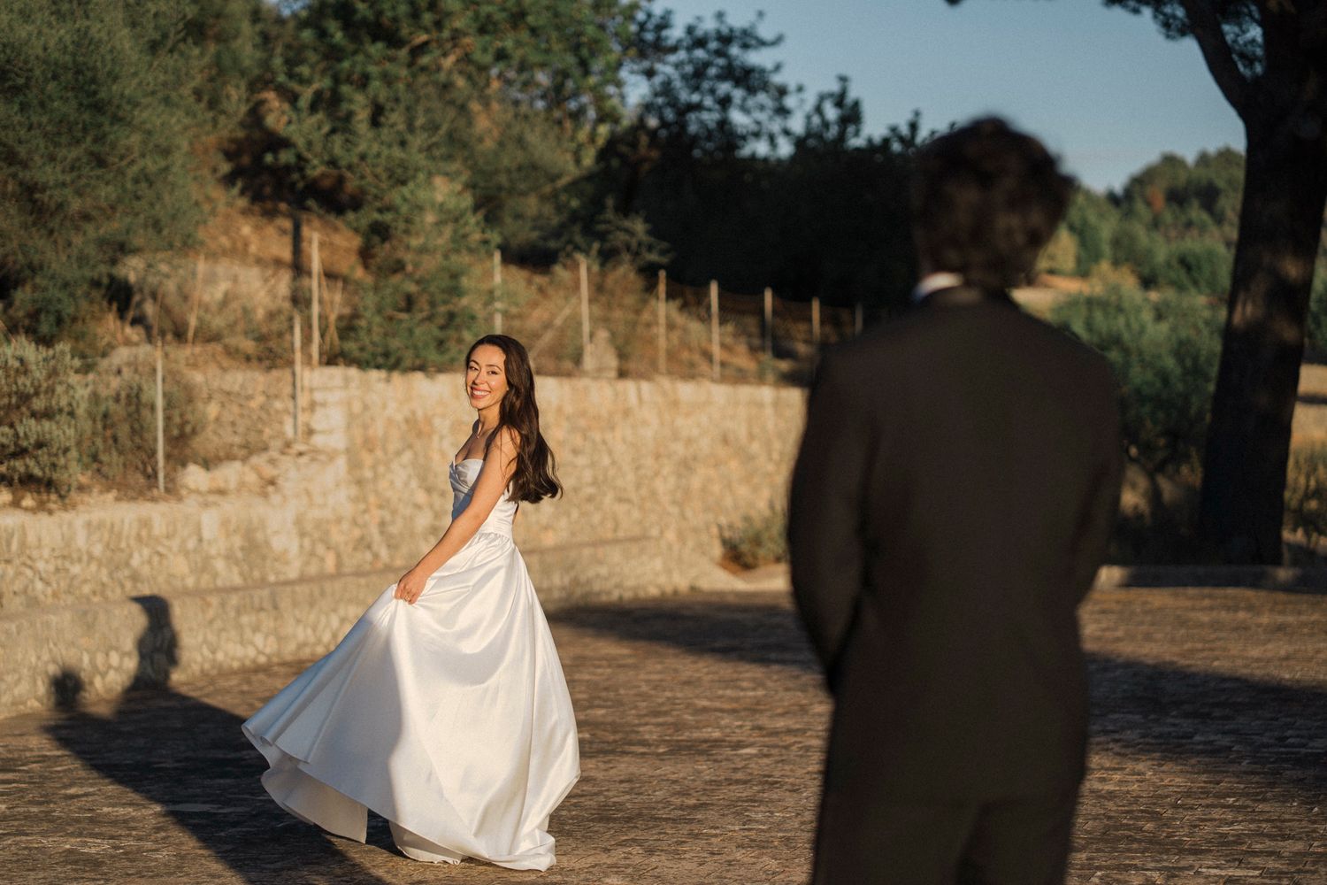 A series of romantic wedding photos captured in a rustic outdoor setting at golden hour.