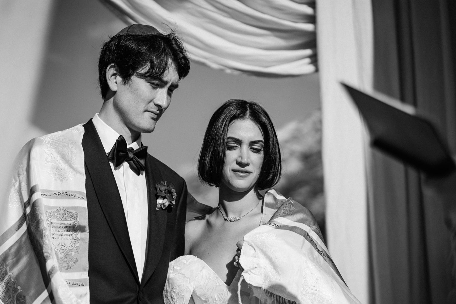 A black and white photo collage of a formal event featuring people in elegant attire and formal wear.