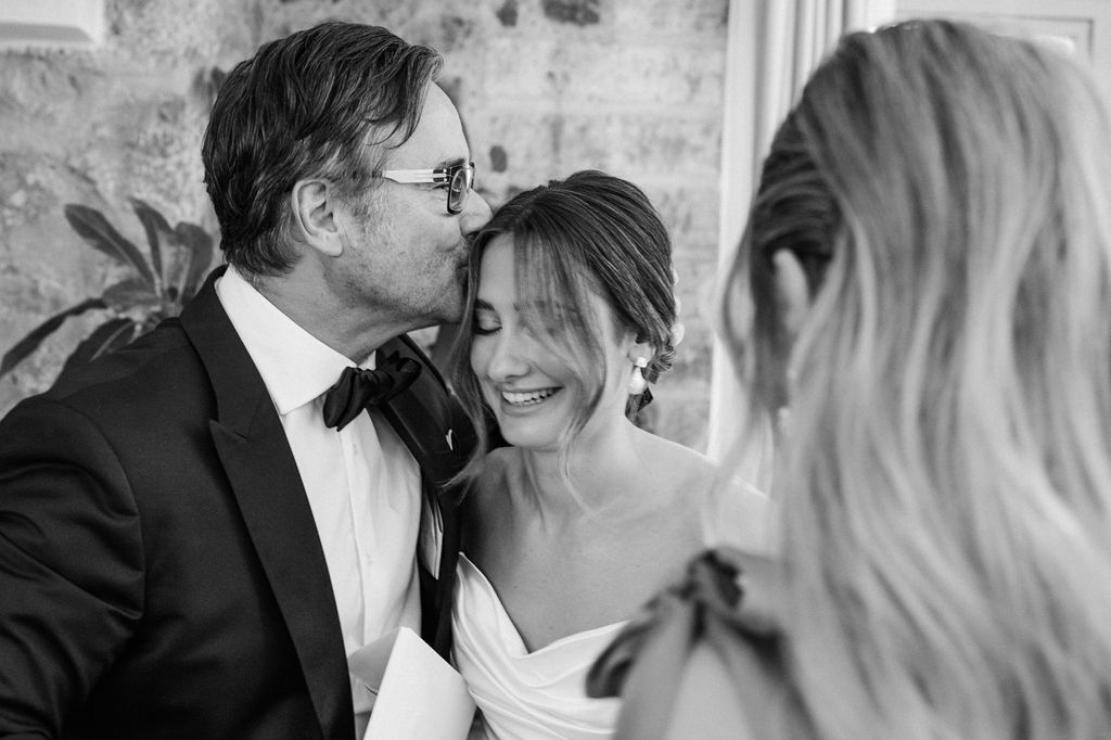 Romantic black and white wedding photography sequence showing tender moments.
