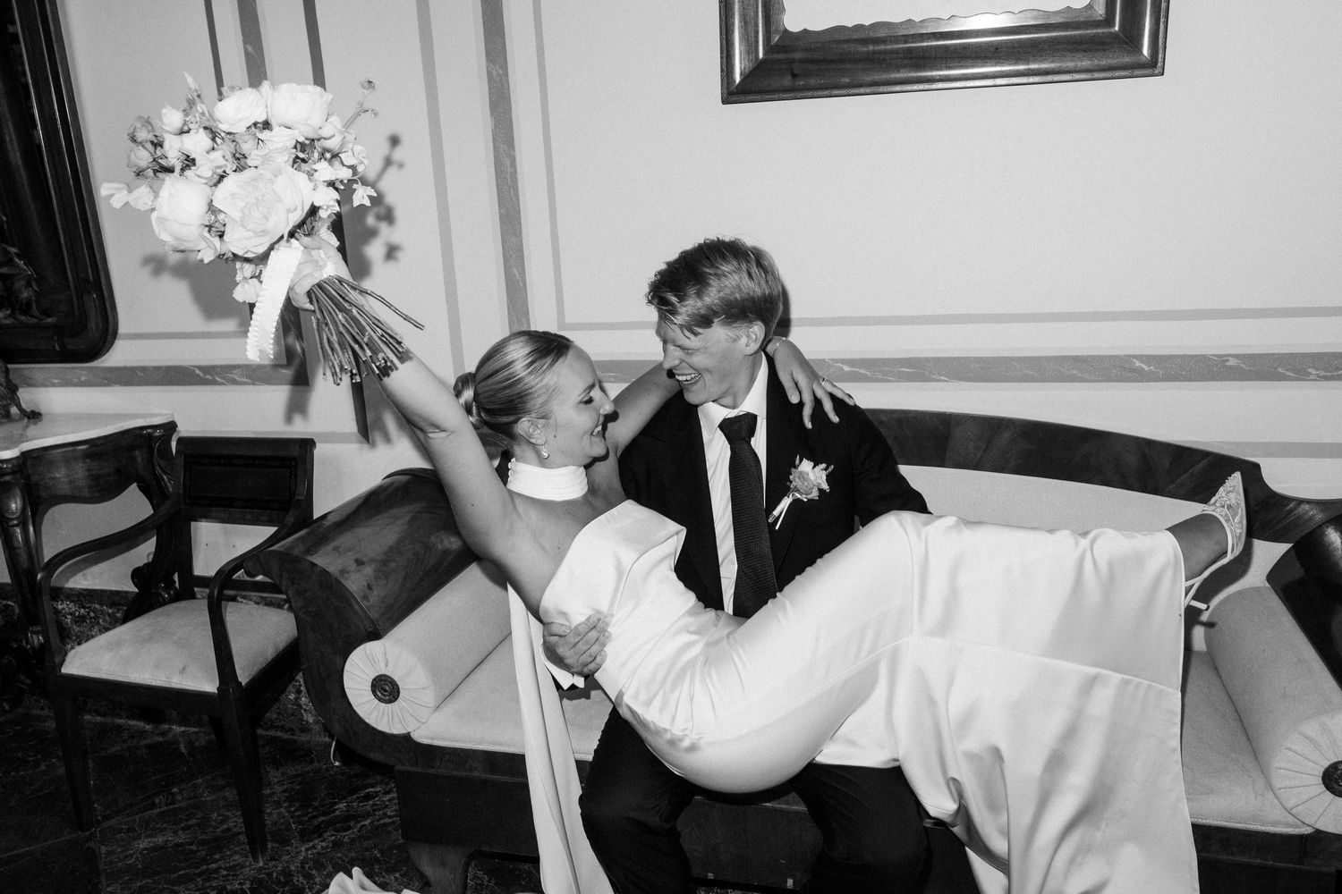 A series of black and white wedding photographs showing romantic dance moves and intimate moments during a reception.