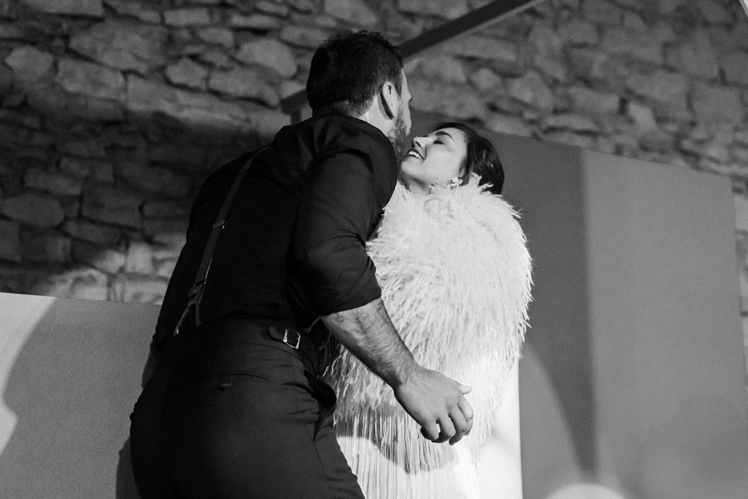 A black and white photo montage showing intimate moments between a couple on their wedding day.