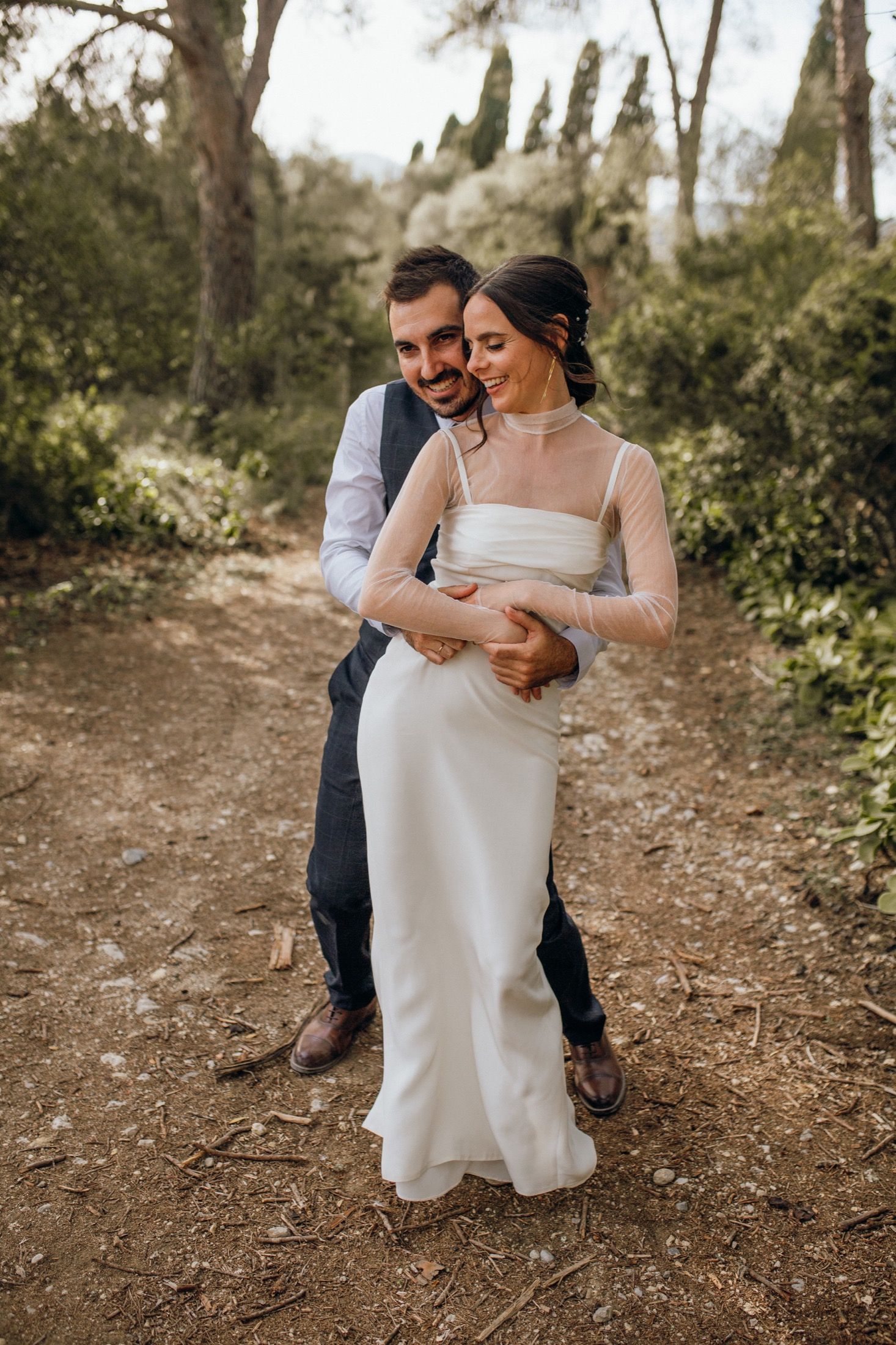 Candid wedding photography sequence showing tender moments between couple on a rustic forest path.