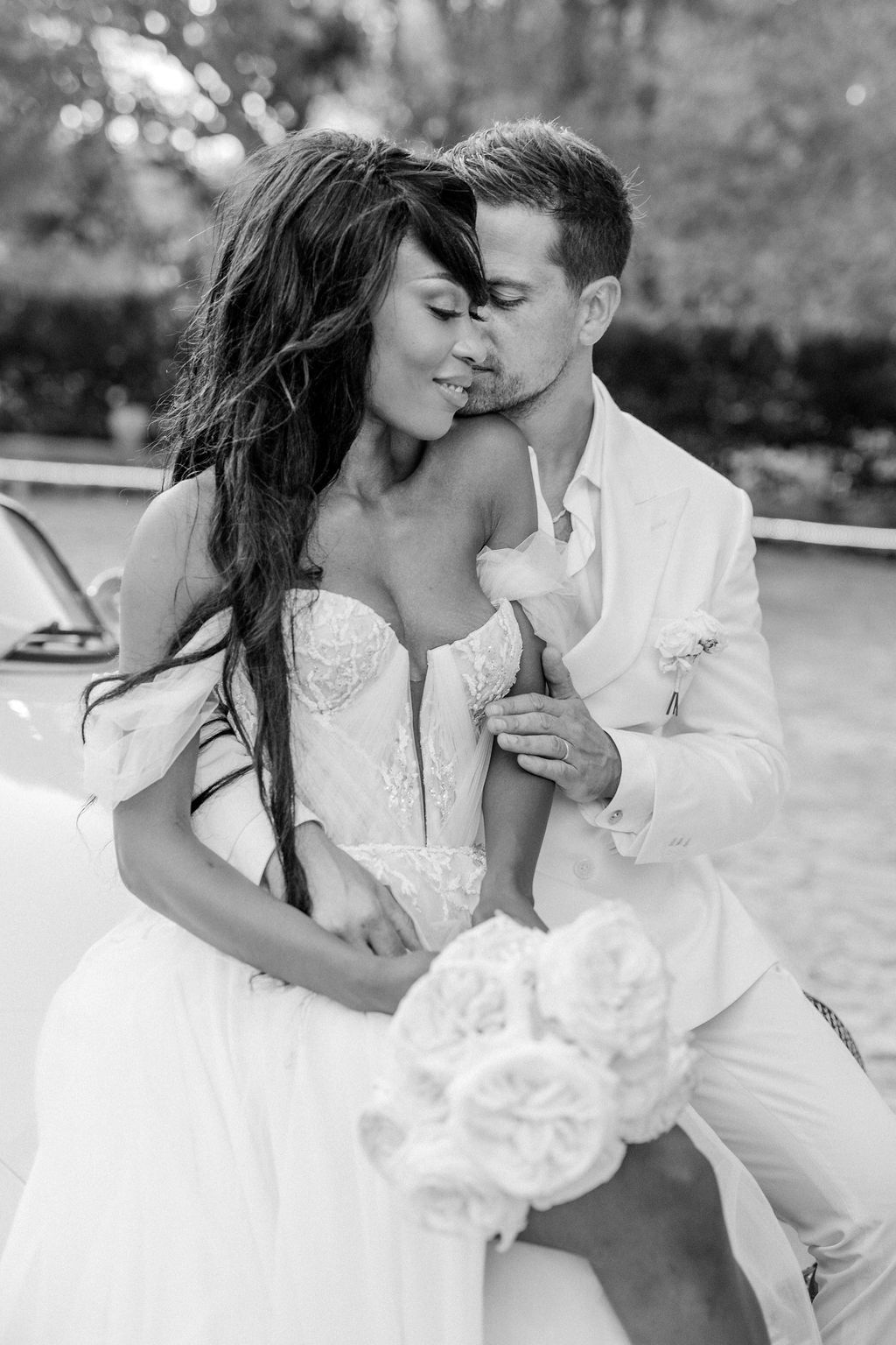 Black and white romantic wedding portraits showing tender moments.