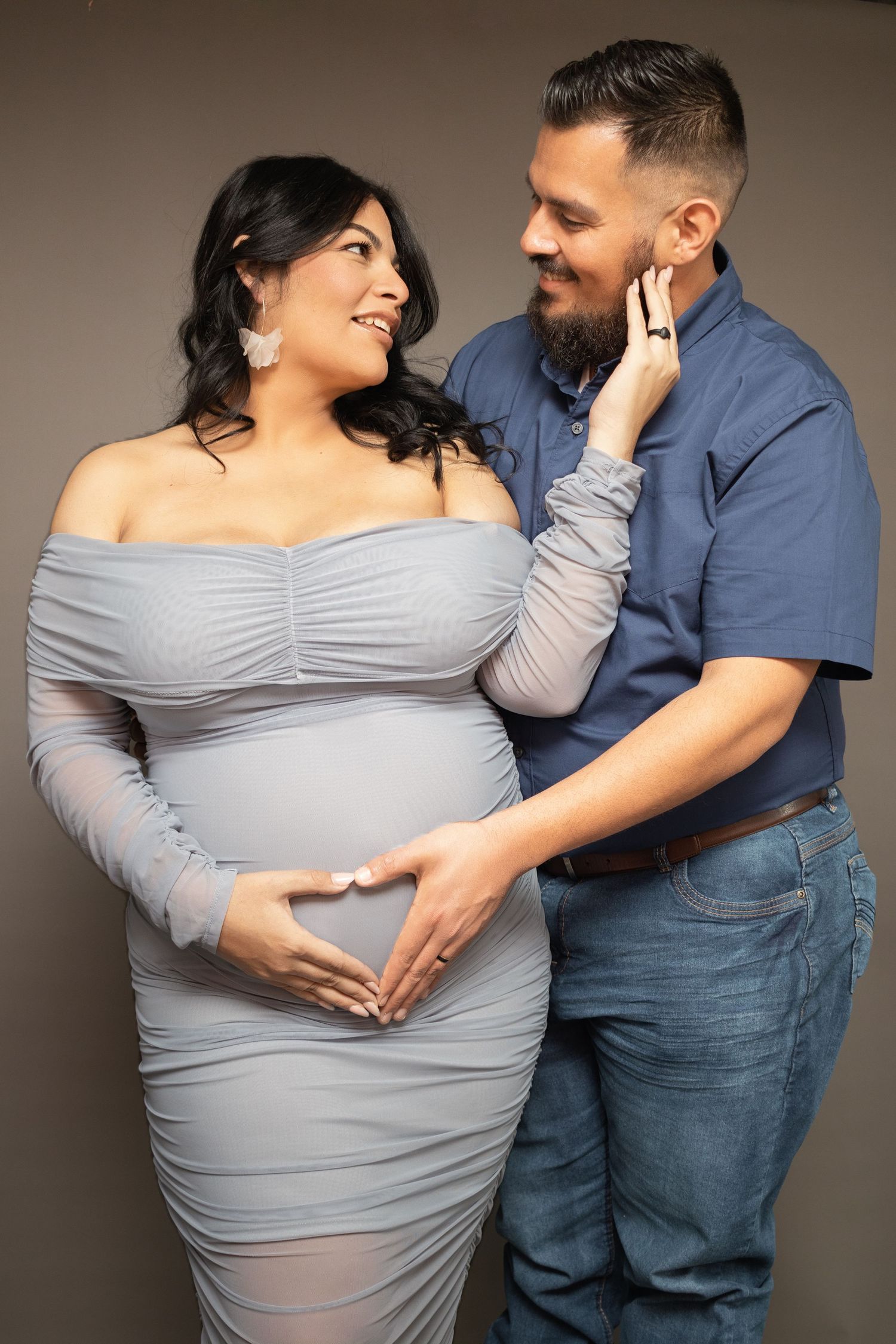 Fort Worth couples maternity photographer captures this beautiful couple in a joyful moment.