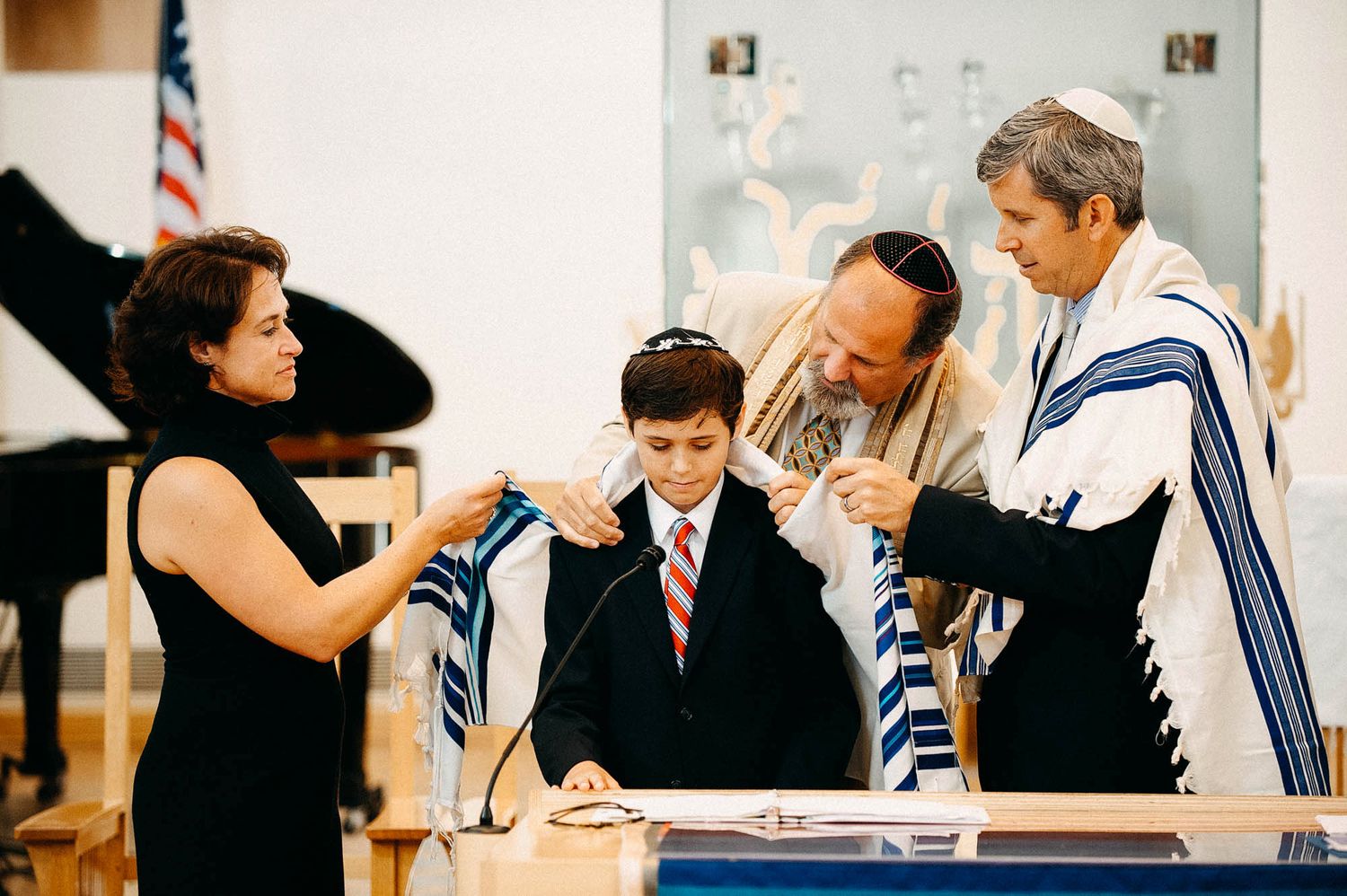 A traditional religious ceremony being conducted with ceremonial garments.
