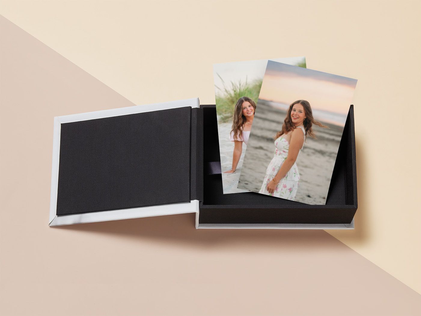 Elegant photo keepsake box with printed portraits of a young woman in a white dress at a beach, displayed on a beige background.