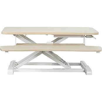 Adjustable height standing desk shown in multiple positions from low to high settings with white desktop surface.
