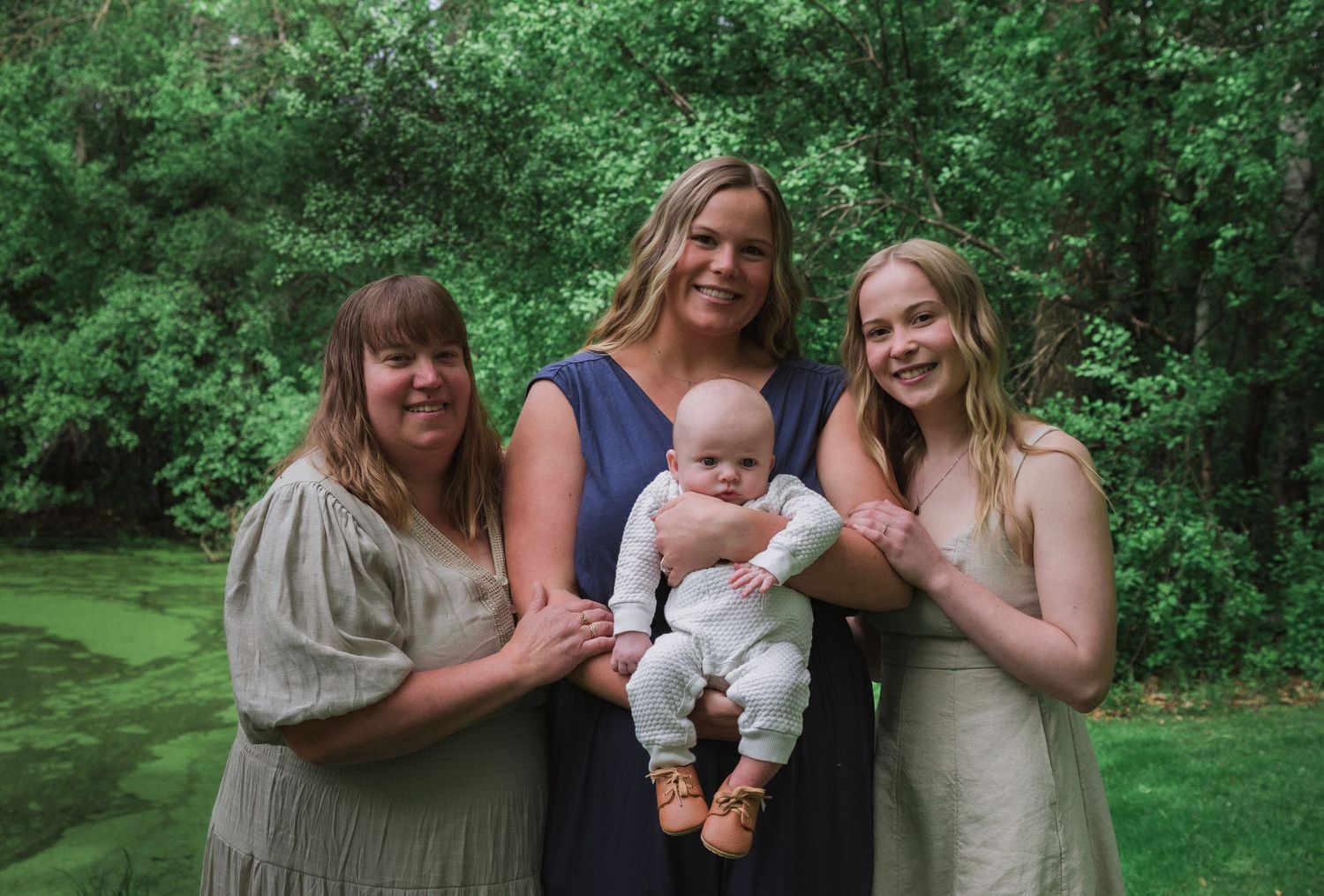 A series of outdoor family photo moments captured in a lush green garden setting with natural lighting and casual poses.