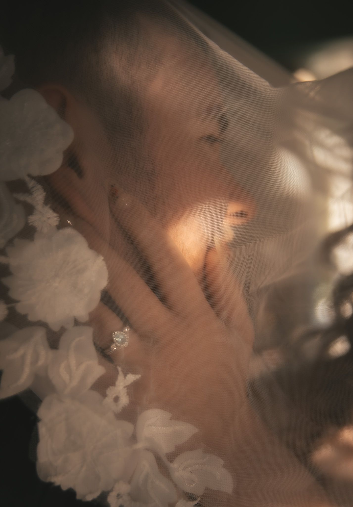 Artistic sequence of ethereal portraits with soft lighting and delicate white floral overlays creating a dreamy atmosphere.