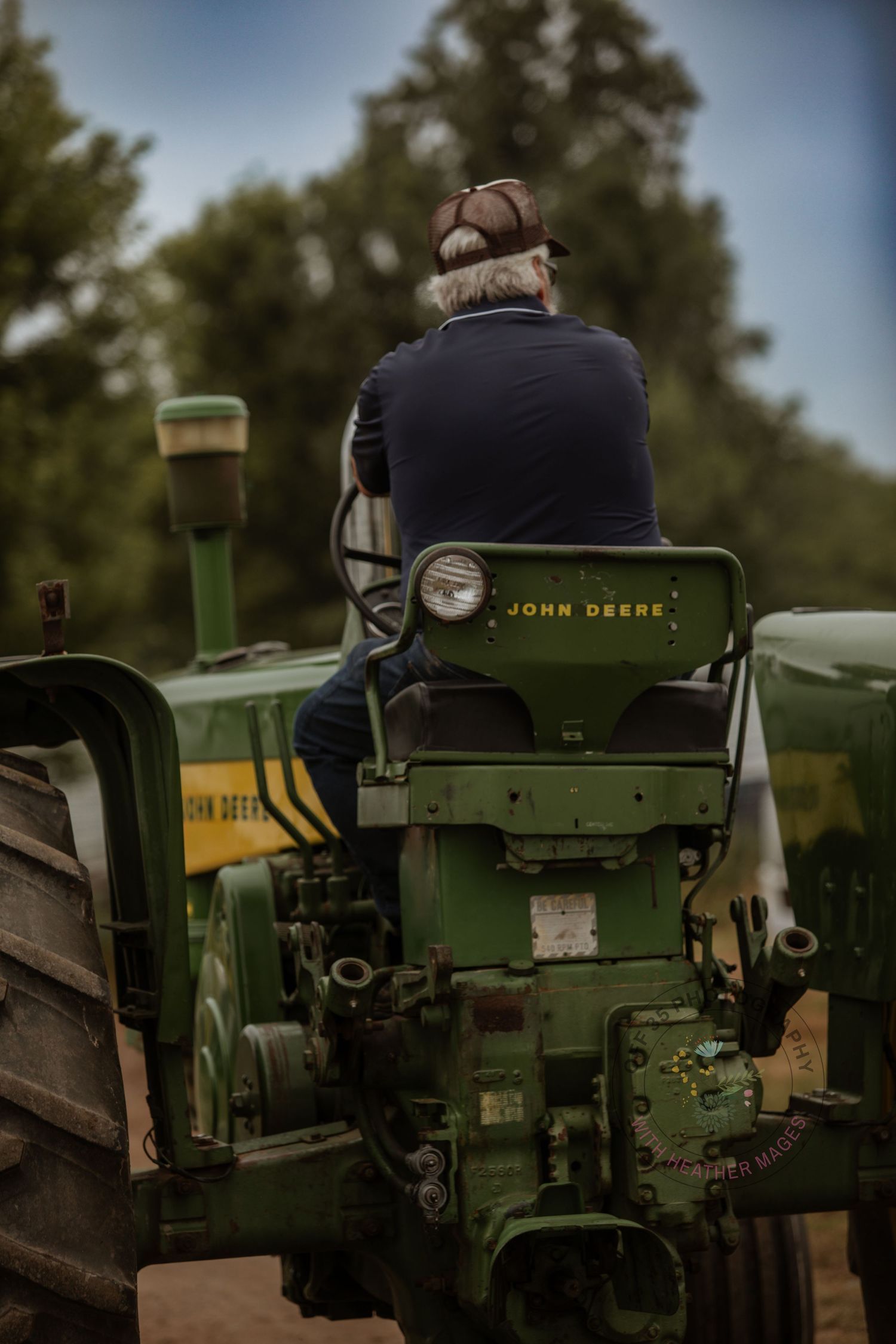 Close-up views of a vintage green John Deere tractor showing various angles of its classic design and machinery.
