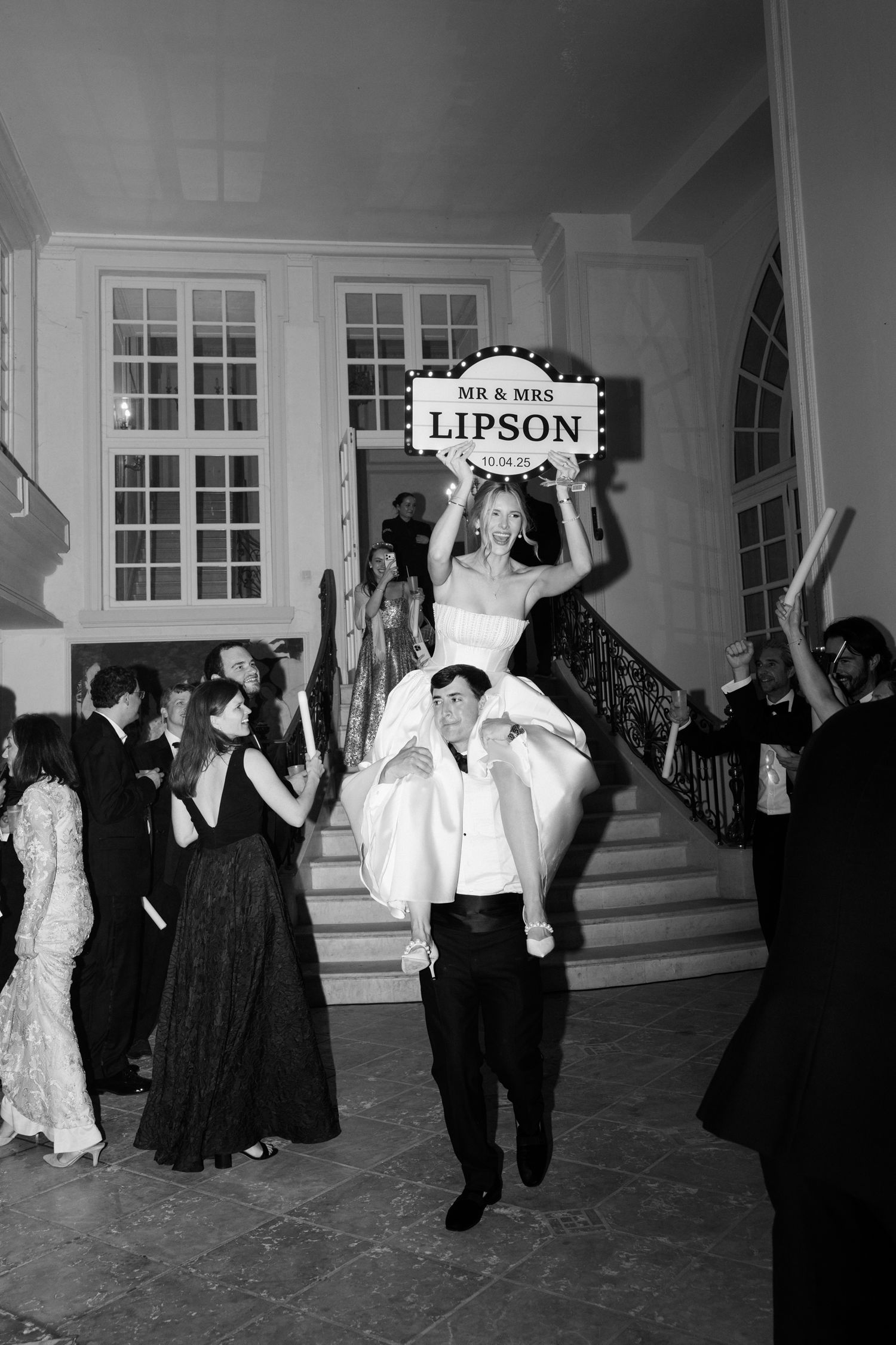 Vintage black and white photos show people dancing and celebrating at what appears to be a formal party or reception.
