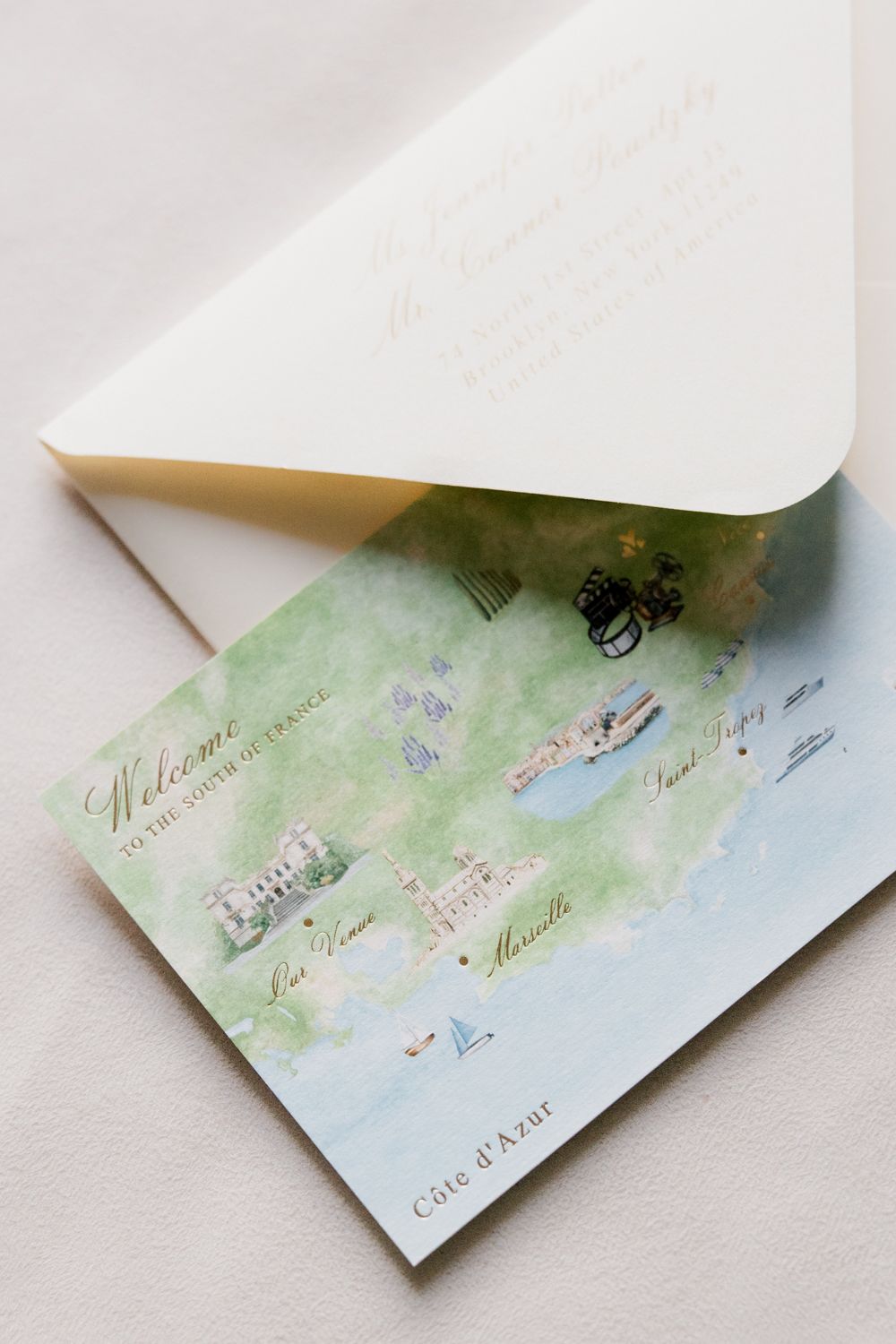 A series of romantic watercolor wedding invitations with delicate blue and green florals unfold across four images.
