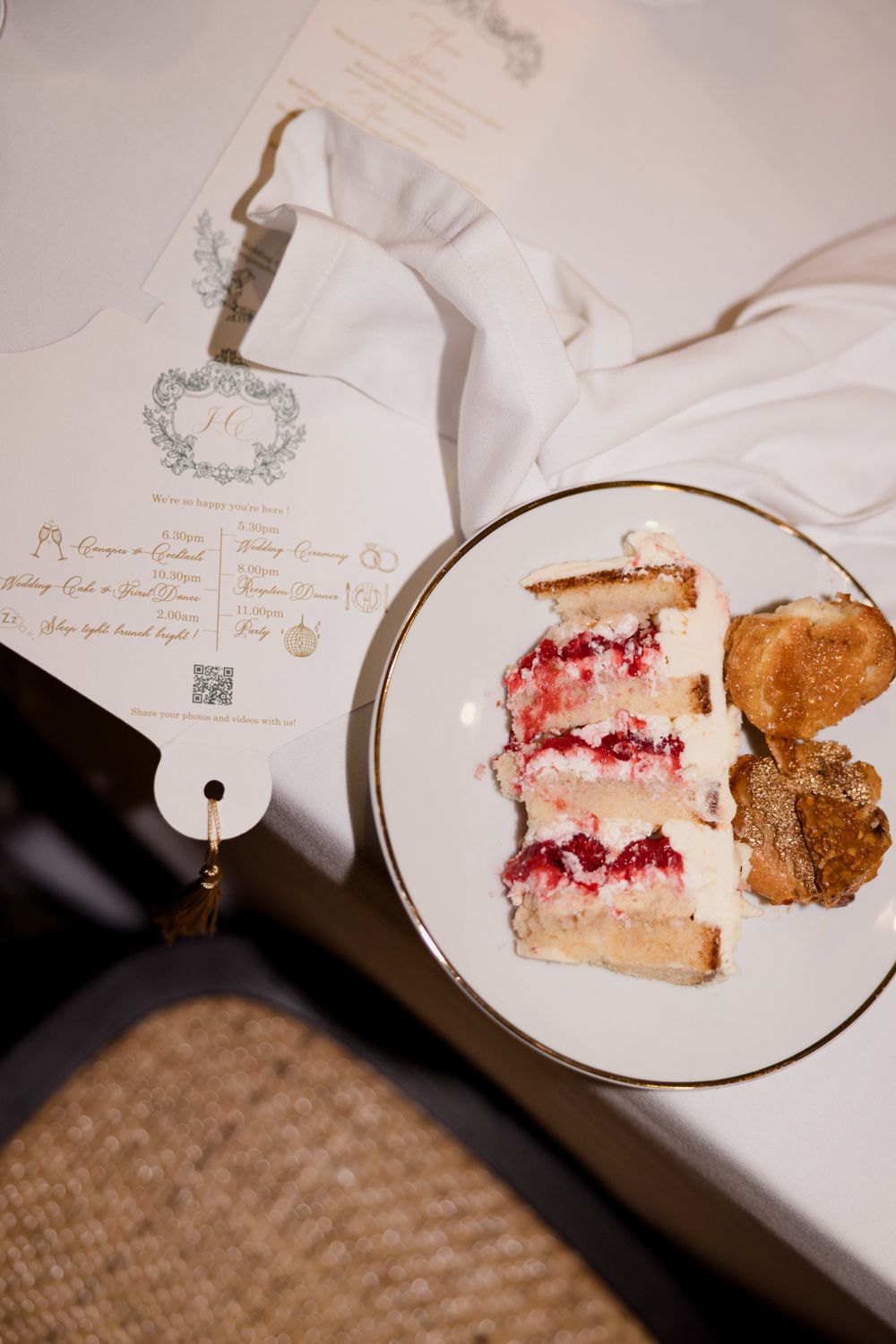 A series of plates showing a slice of layered cake with bright red filling being eaten progressively with a spoon.