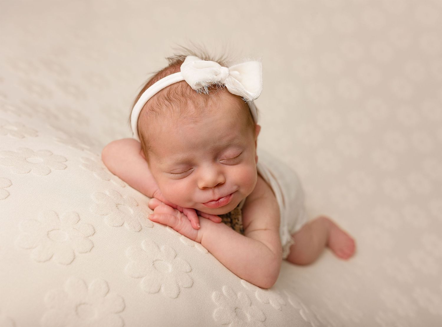 Table poses of a beautiful newborn- A detailed shot of a newborn emphasising on the precious details of early days.