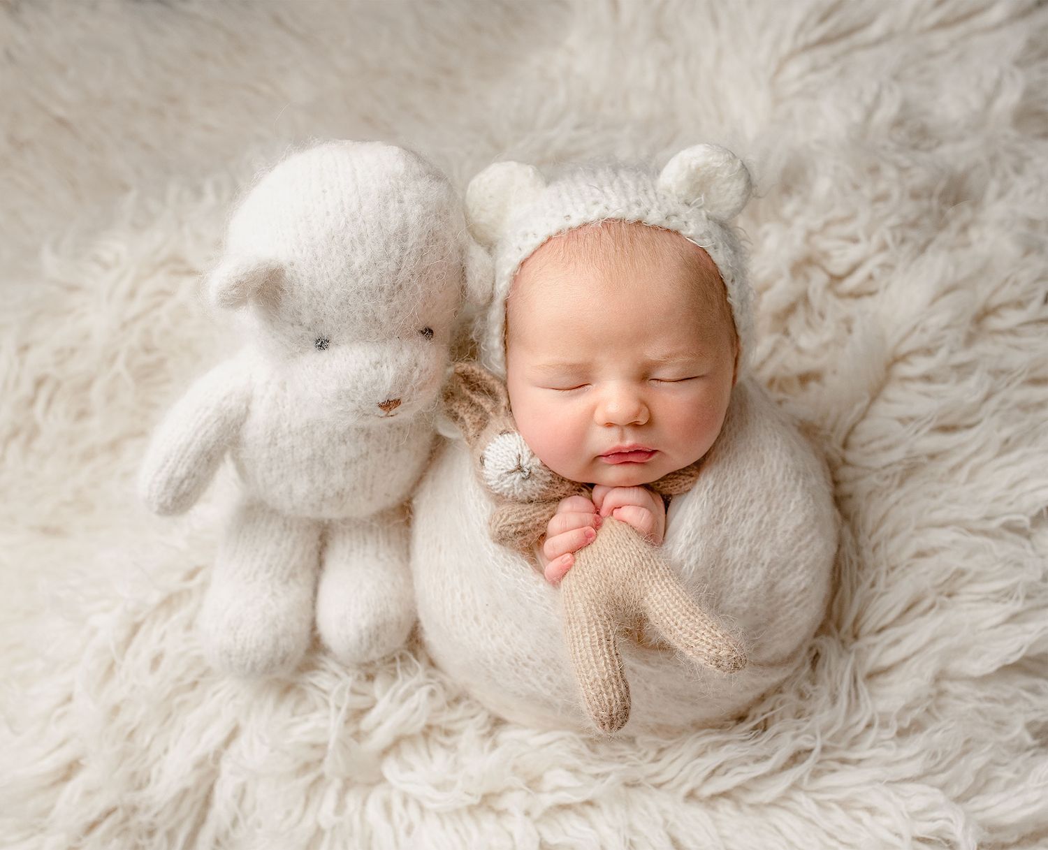 A gorgeous baby boy and his Teddy bear at his first photoshoot session, Capturing the early precious years.