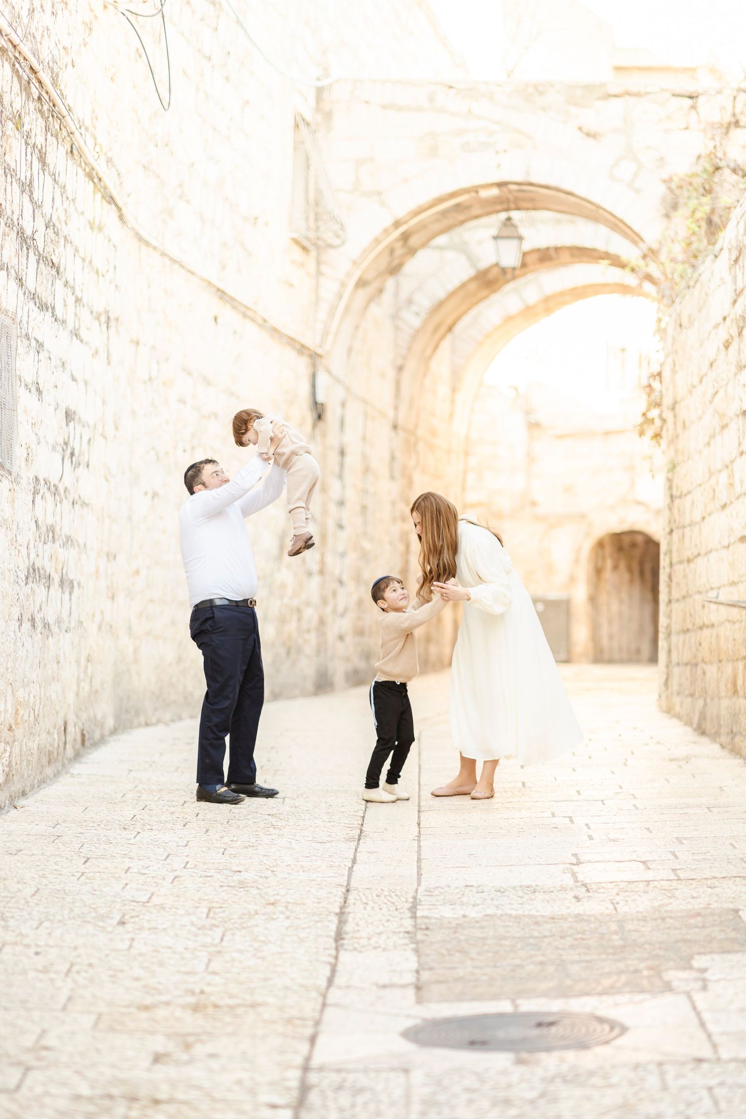 loving family photo in the old city of Israel