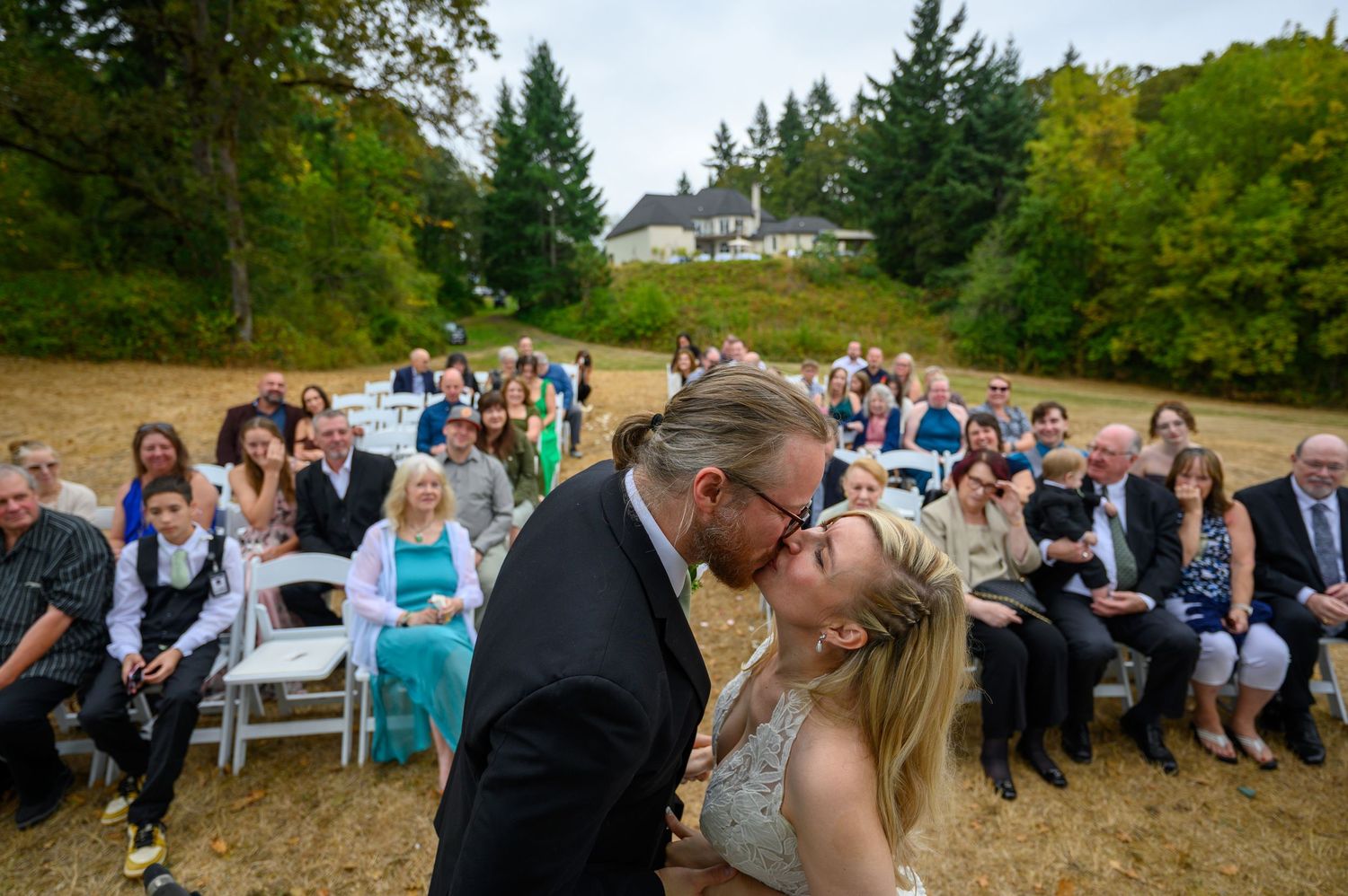 A series of wedding photos showing joyful outdoor celebration moments with guests and the happy couple.