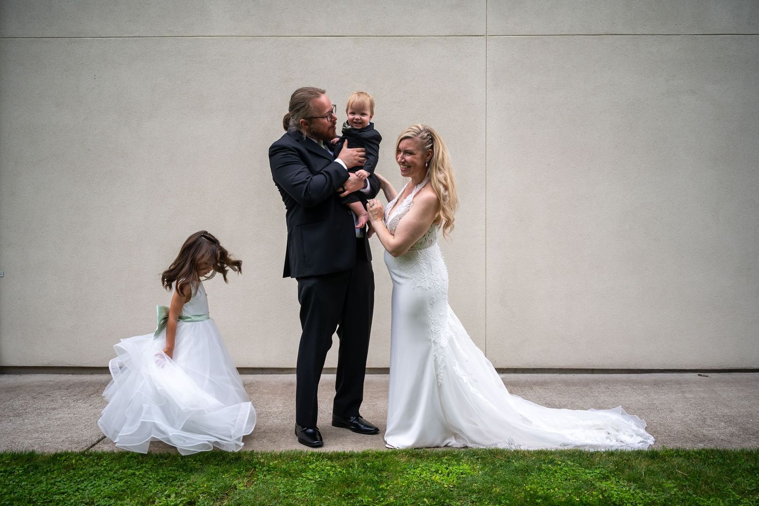 A romantic wedding photo sequence shows a couple playfully interacting against a gray wall in formal attire.