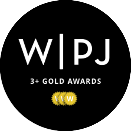 Black circular photography association badges with gold accents and award designations.