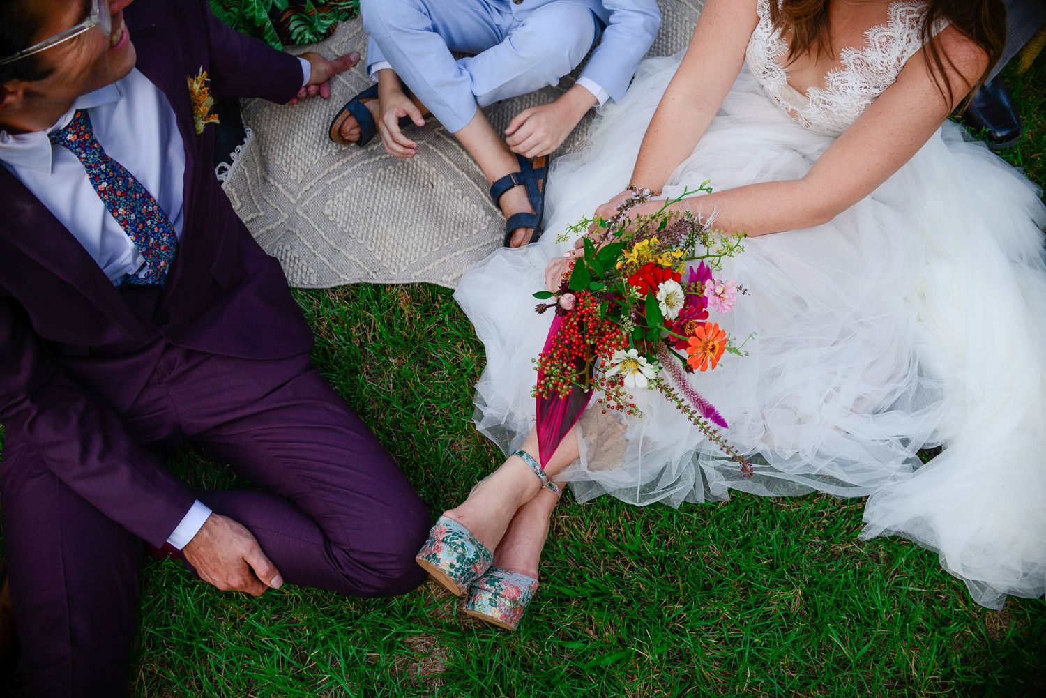 A row of wedding photos showing the bride's white dress and colorful bouquet details against green grass.
