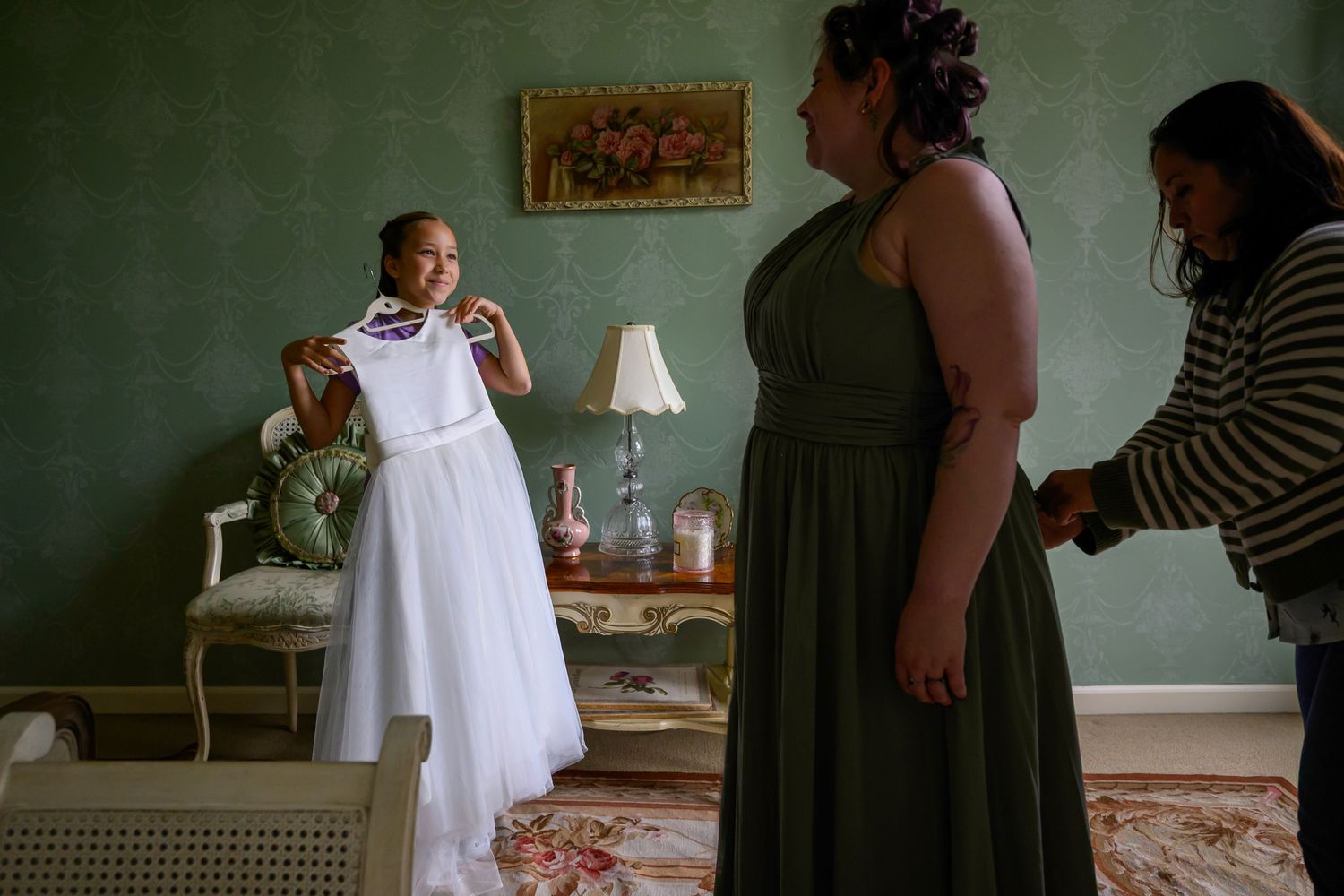 A series of six connected images showing someone in a white dress moving through a dimly lit interior space.