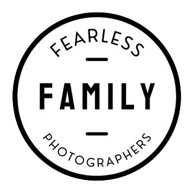 Professional photographer membership badges with fearless and family designations.