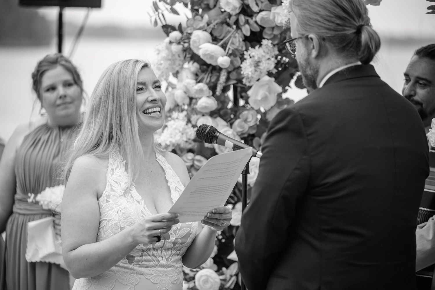 Sequence of emotional black and white wedding photos capturing candid celebration moments.