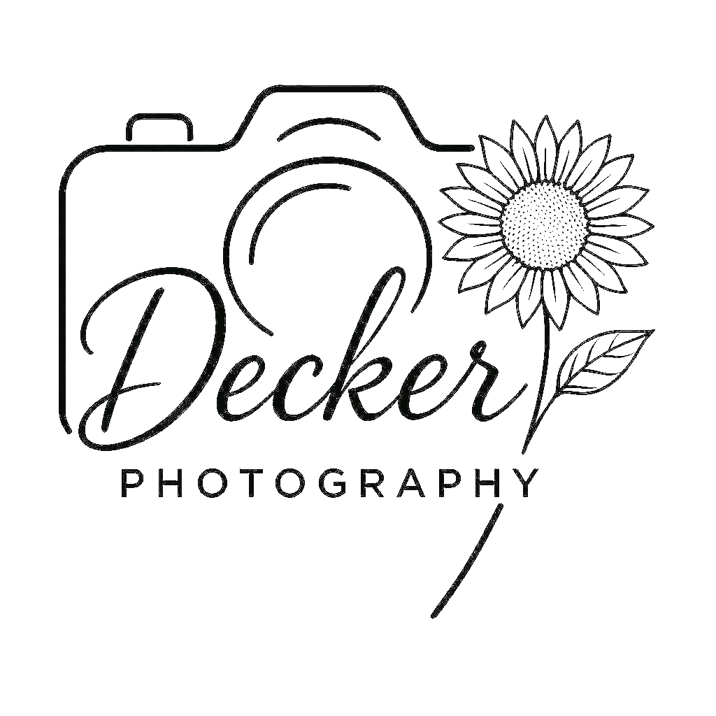 Decorative logo design for photography business with floral elements and script font.