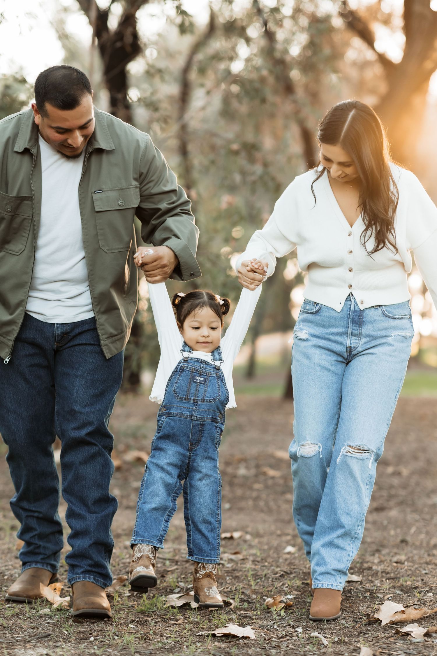 Family photo session in Orange County wearing coordinated neutral and denim outfits