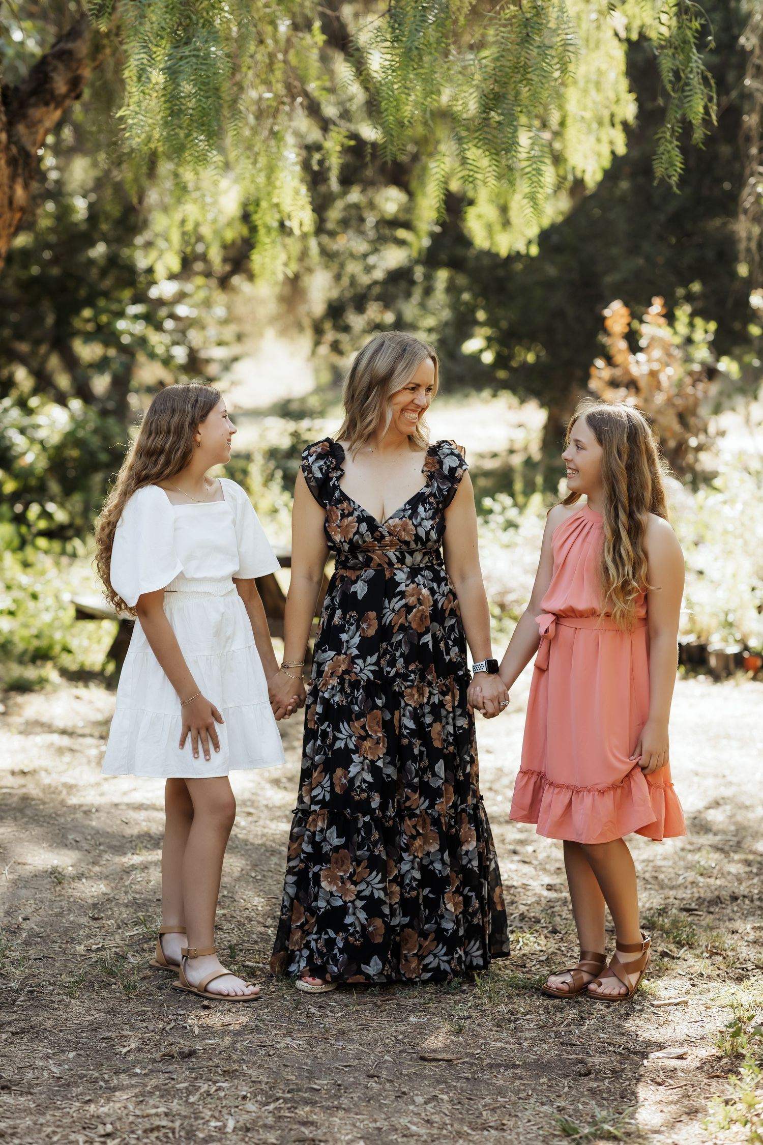 Park family photo session in Orange County wearing earthy tone outfits