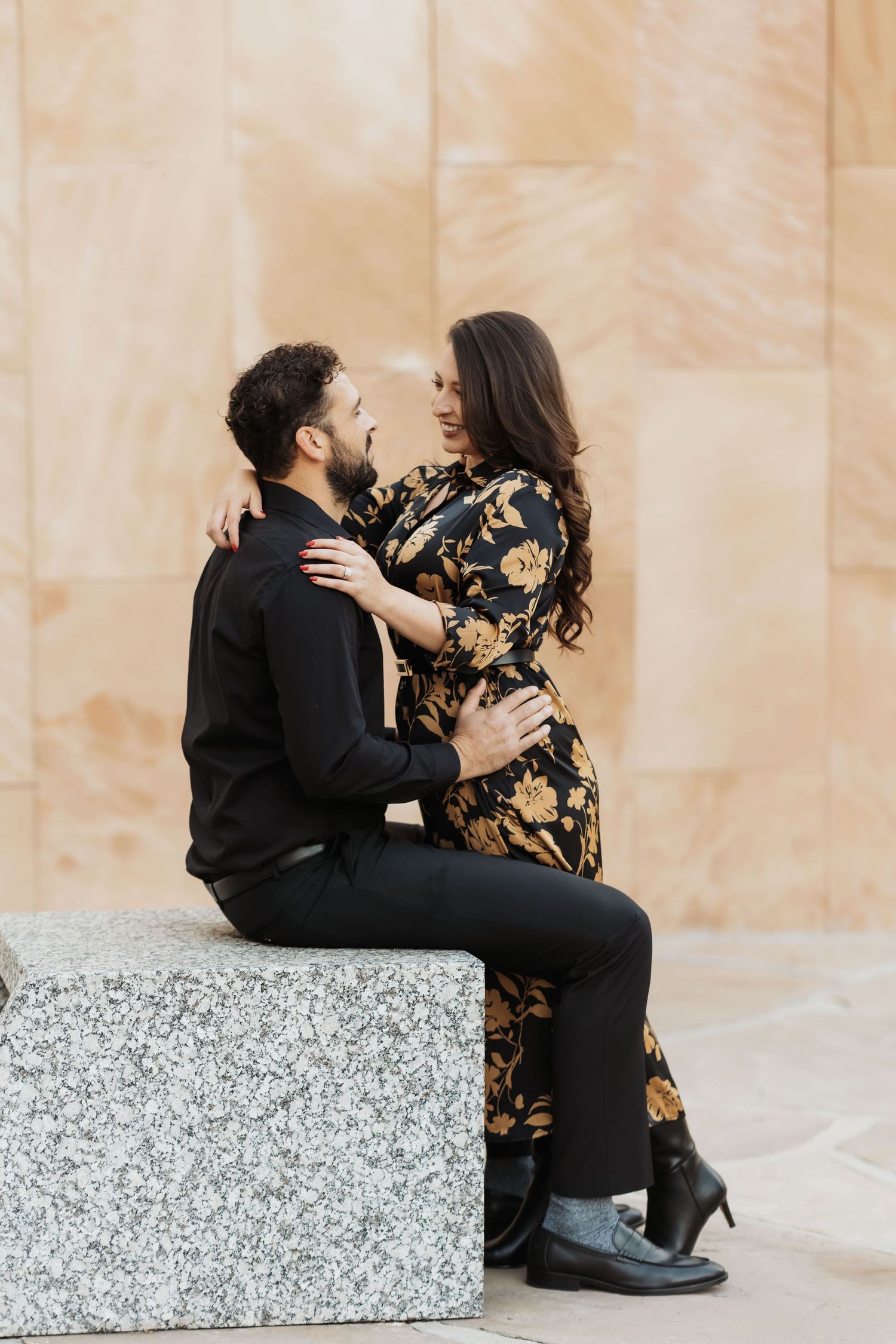 Candid moment of couple looking at each other during a couples photo session in Costa Mesa