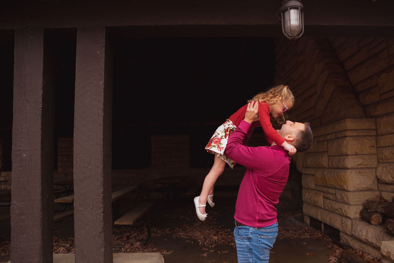 Series of playful interactions captured in dramatic lighting under stone archway.