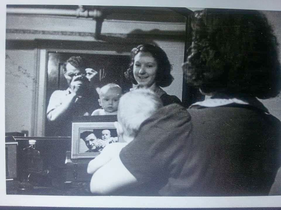 Vintage black and white photographs arranged in a sequence showing intimate moments.