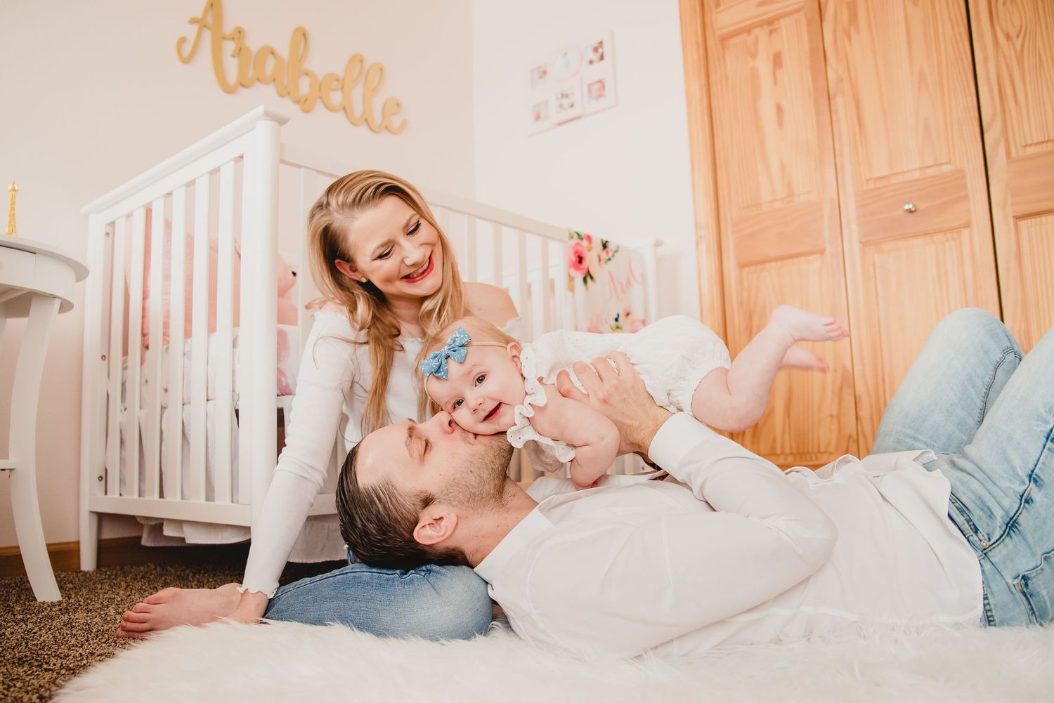 Nursery scene with wooden furniture and soft natural lighting.
