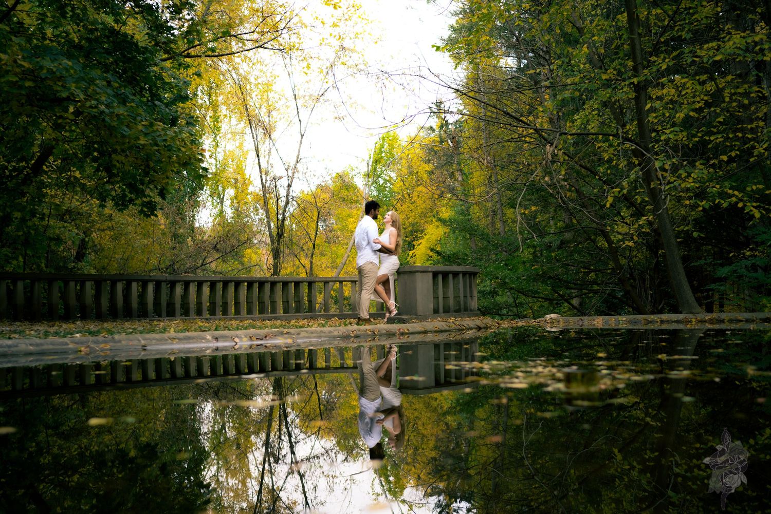 A couple hugging lovingly during an engagement session by Porsche Aremia
