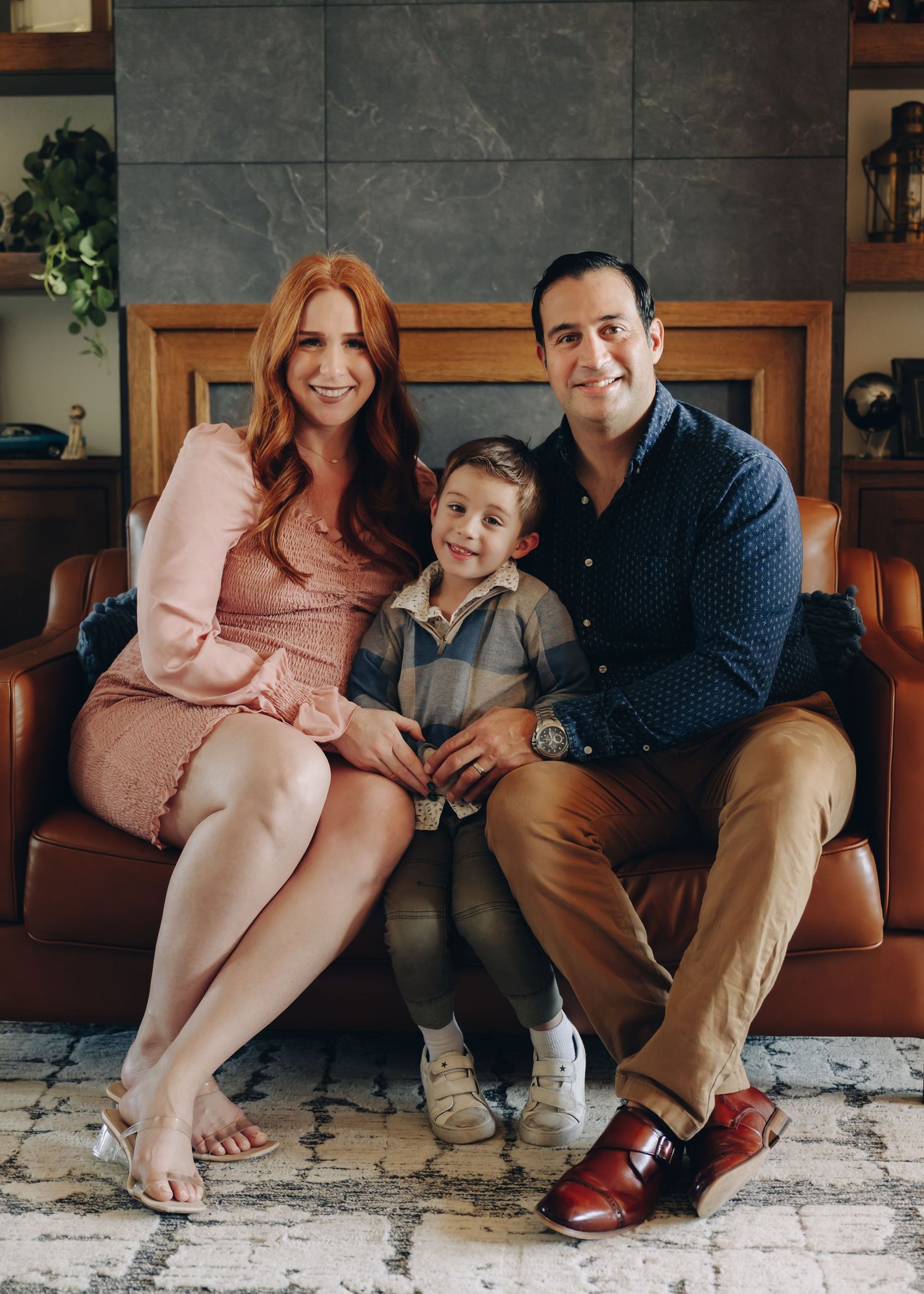 Four candid photos show people sitting together on a brown leather couch in a cozy living room setting.