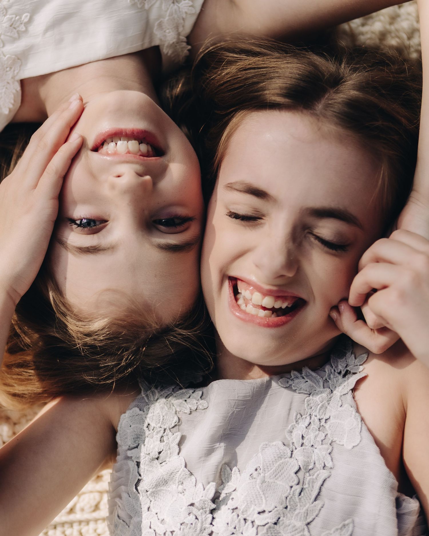 A series of intimate close-up portraits showing affectionate moments in soft, warm lighting.