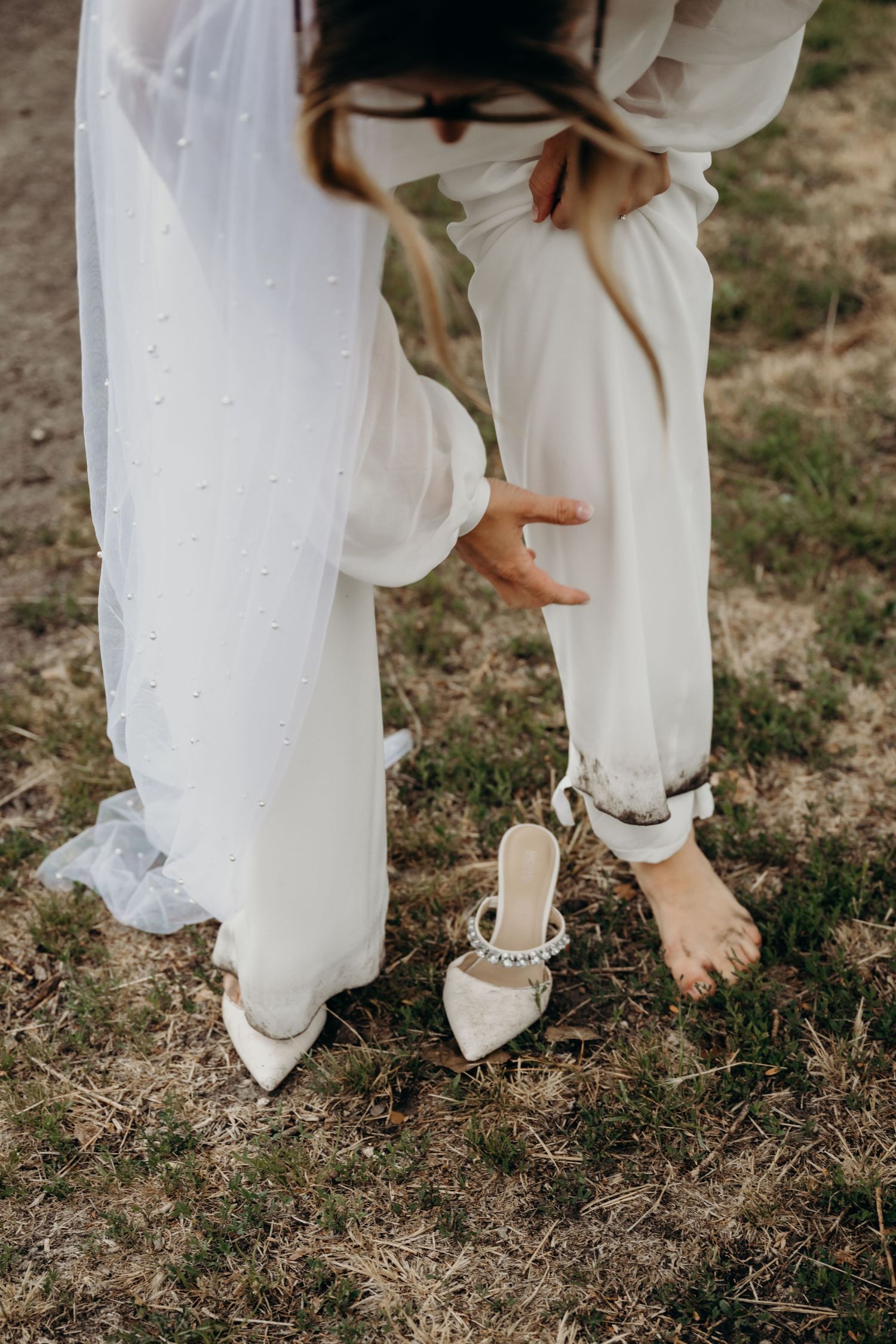 Series of wedding dress details showing bare feet and shoes on grass.