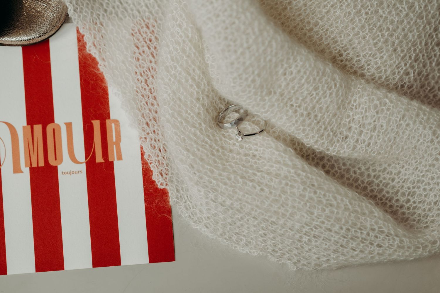 White wedding decor and red striped popcorn containers create a festive carnival-themed reception setup.